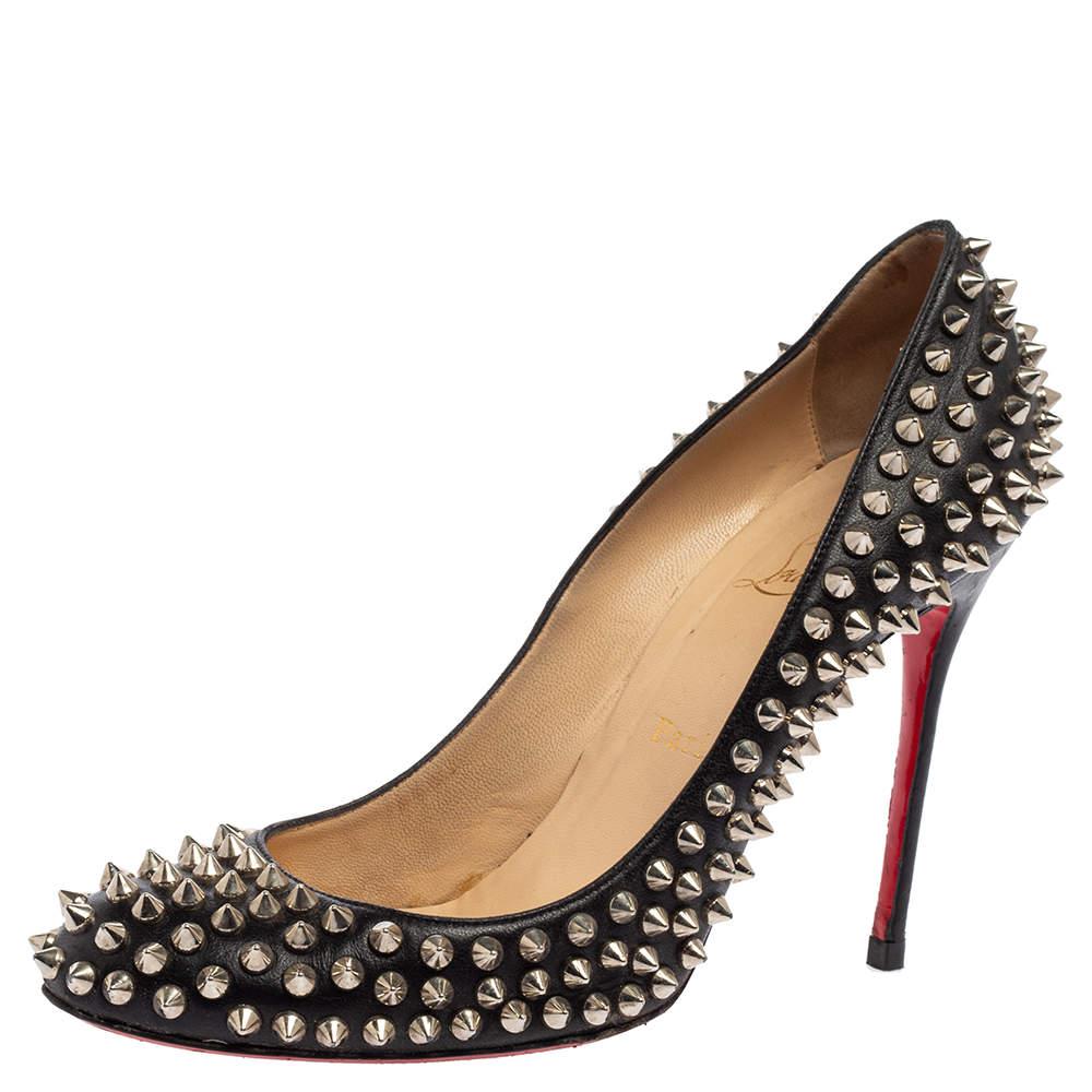 These Christian Louboutin pumps bring forth a contemporary design that suits casual outfits effortlessly. Crafted from leather, the pumps come in black with spike decorations, slim heels, and durable soles covered in the signature red.

