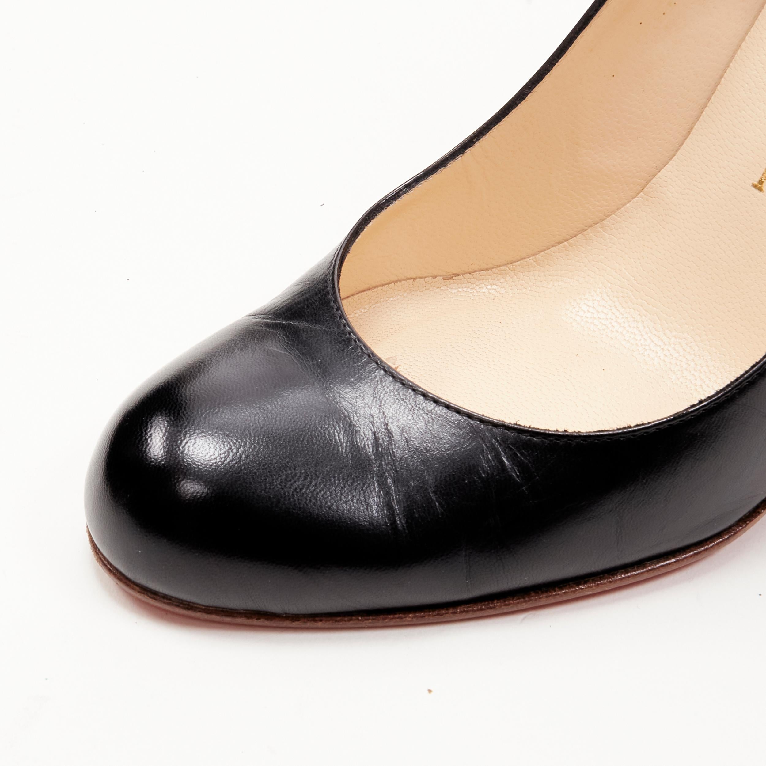 Women's CHRISTIAN LOUBOUTIN black leather stacked wooden wedge heel EU37.5