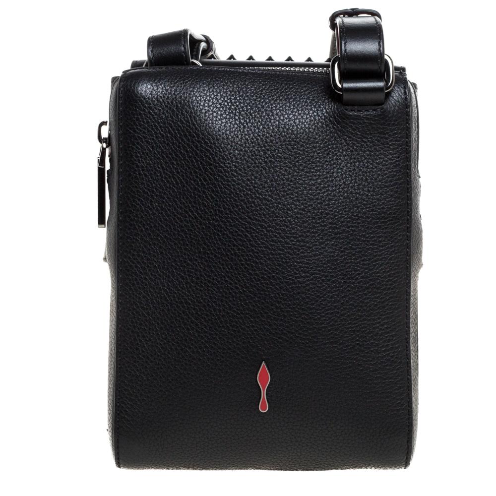 Carefully designed to evoke a fashionable feel, this leather bag from Christian Louboutin is sure to make heads turn. Lined with the finest fabric and detailed with studs on the front, this creation offers both style and durability. Casually sling