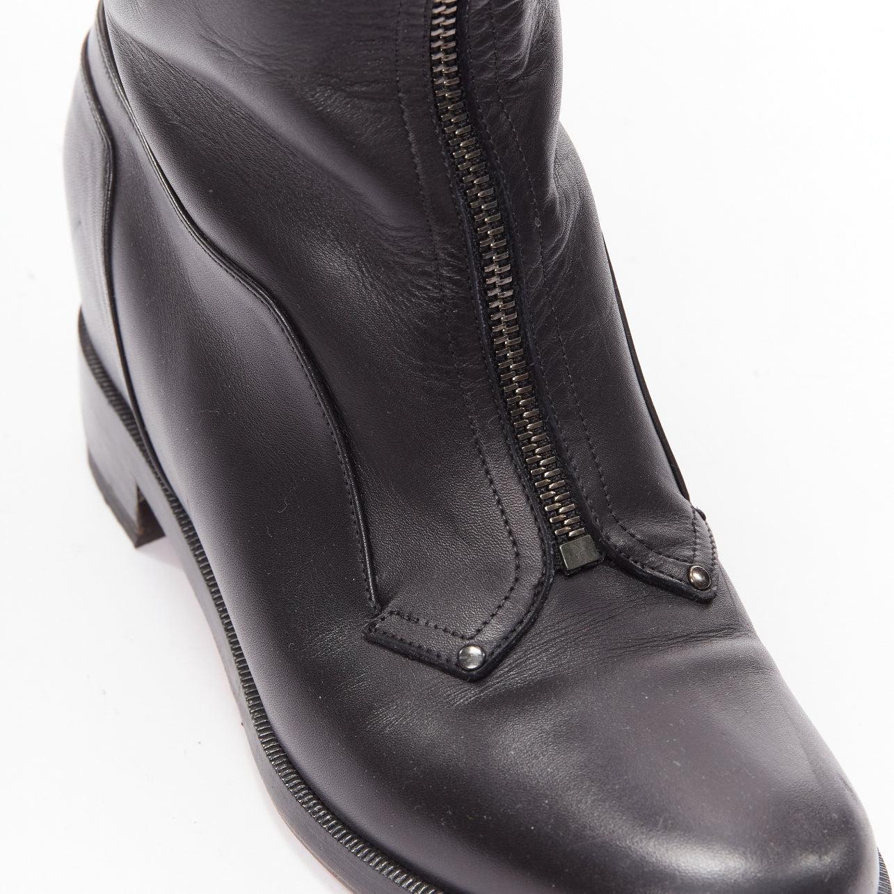 CHRISTIAN LOUBOUTIN black leather zip front concealed wedge riding boot EU40
Reference: TGAS/D01006
Brand: Christian Louboutin
Material: Leather, Wood
Color: Black
Pattern: Solid
Closure: Zip
Extra Details: Zip front with signature Louboutin red