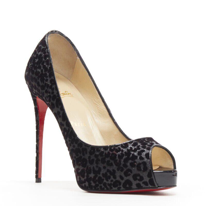 CHRISTIAN LOUBOUTIN black leopard velvet litter peep toe platform pump EU37 US7
Reference: TGAS/A04360
Brand: Christian Louboutin
Model: Peeptoe platform
Material: Leather
Color: Black
Pattern: Leopard
Made in: Italy

CONDITION:
Condition: