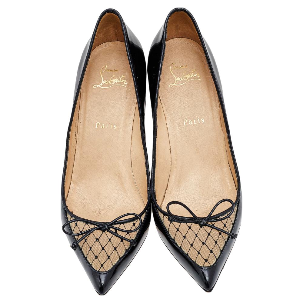 Amp up your trend factor by wearing these pumps from the House of Christian Louboutin. They are made from black mesh and patent leather on the exterior, with a bow motif augmenting the pointed toes. To beautify their shape, they come with red soles