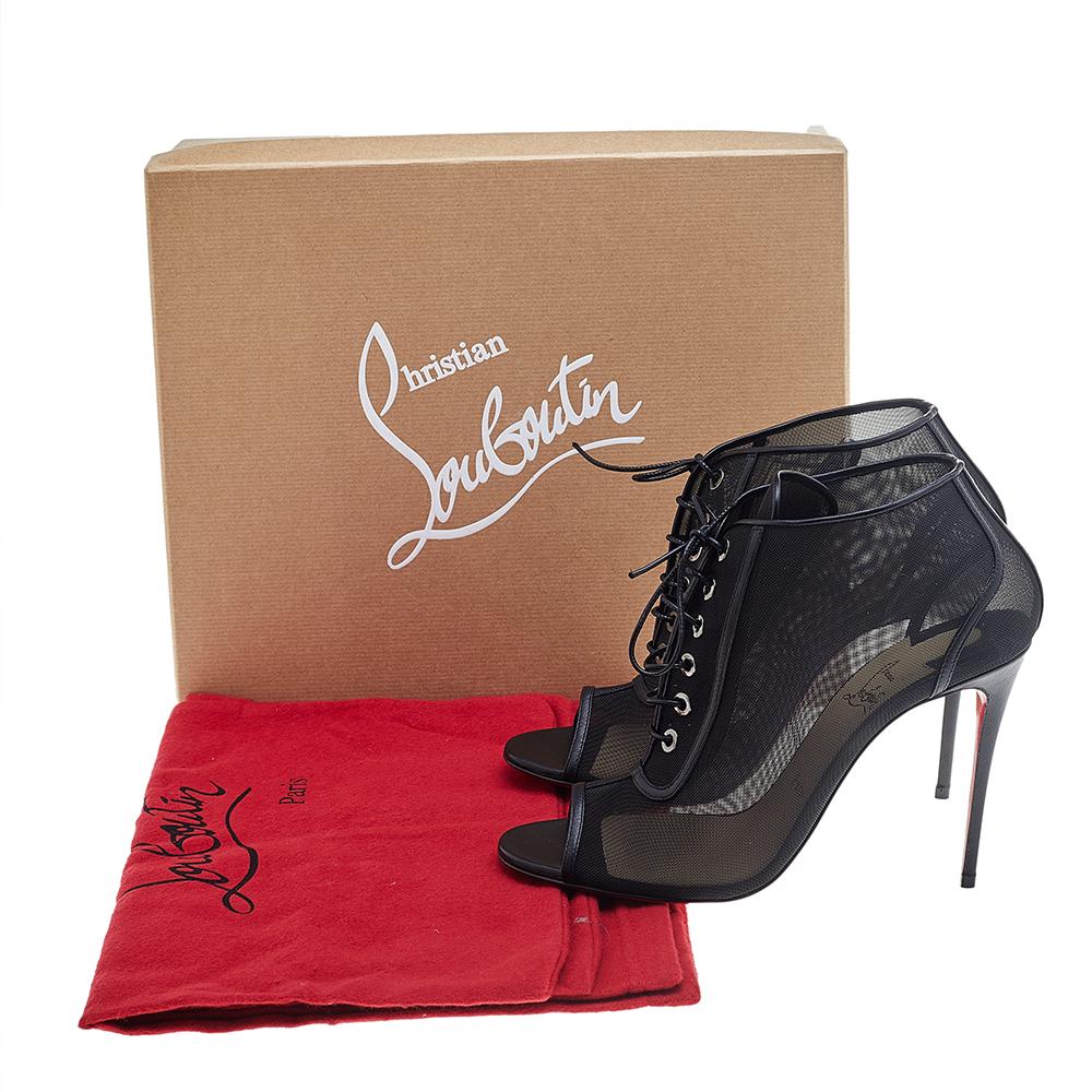 Feel your glamorous best wearing these Christian Louboutin open-toe booties. Made from mesh and leather, the black pair is truly feminine in its design and flaunts gorgeous lace-up fronts. Pair the 10.5 cm high heels with dresses or shorts.

