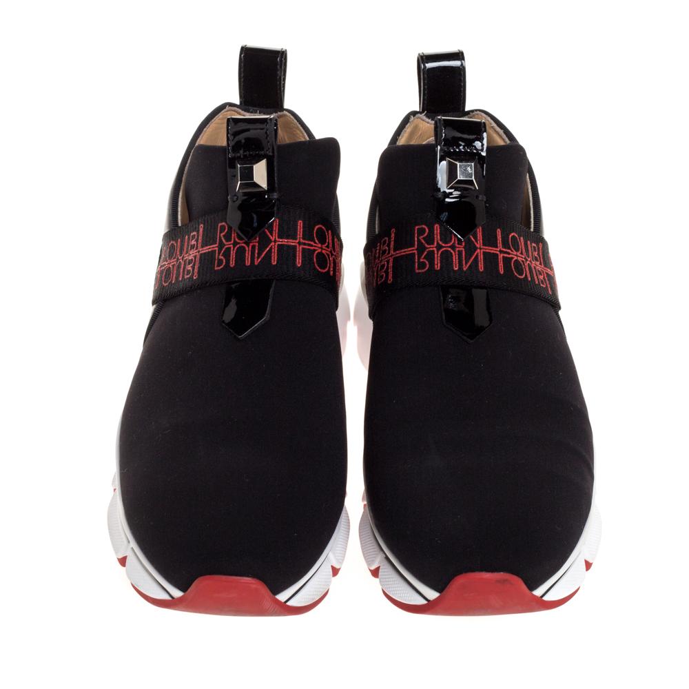 Sleek and luxe, these slip-on sneakers by Christian Louboutin will enhance your outfits by giving them an edge. Meticulously crafted from neoprene and leather, they carry the signature design on the vamps and pull tabs at the counters. The pair is