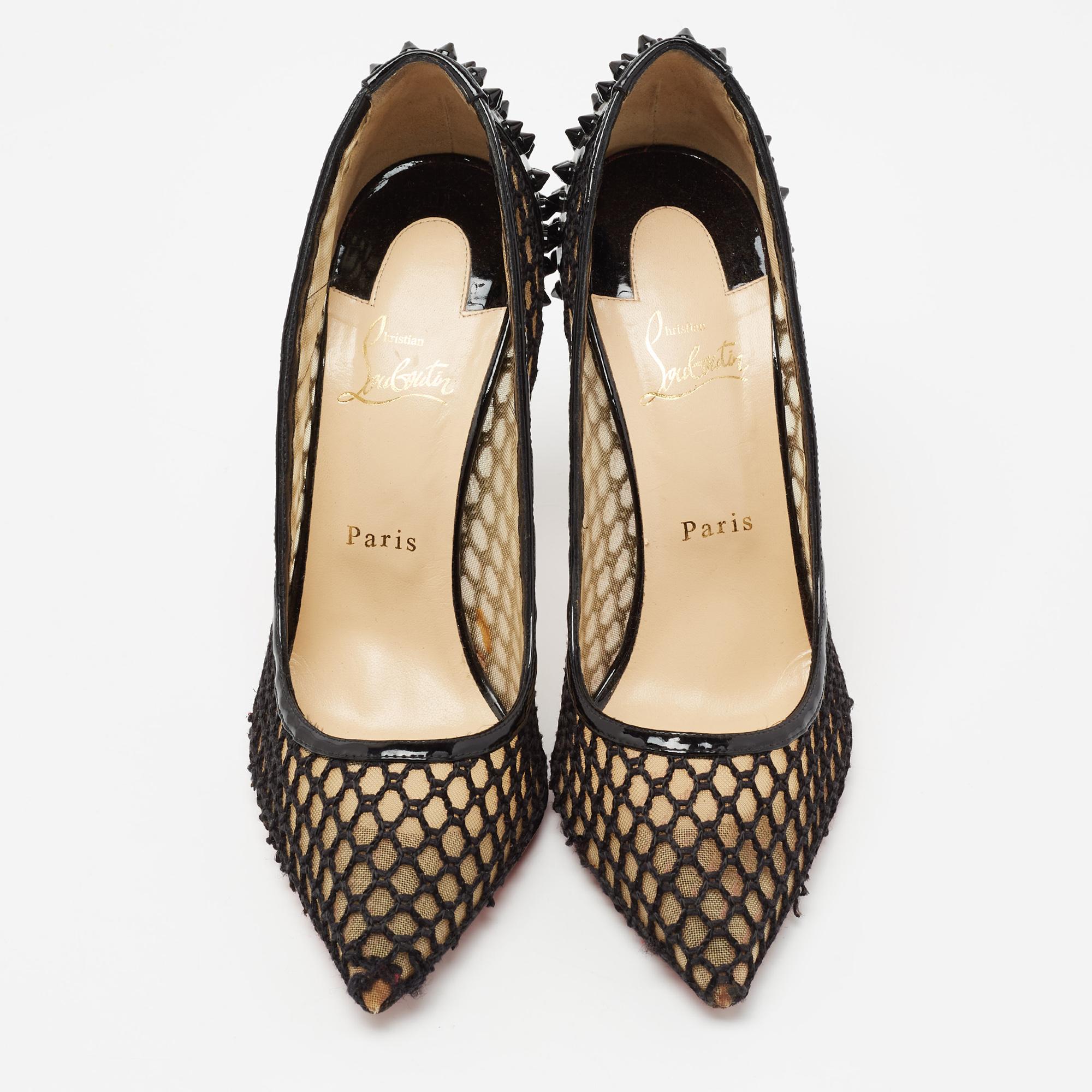 Fabulous and elegant, these Guni pumps will make you fall in love with Christian Louboutin's style all over again. Neatly designed using black net and patent leather, these pumps are accentuated with pointed toes and slim heels. They have a slip-on