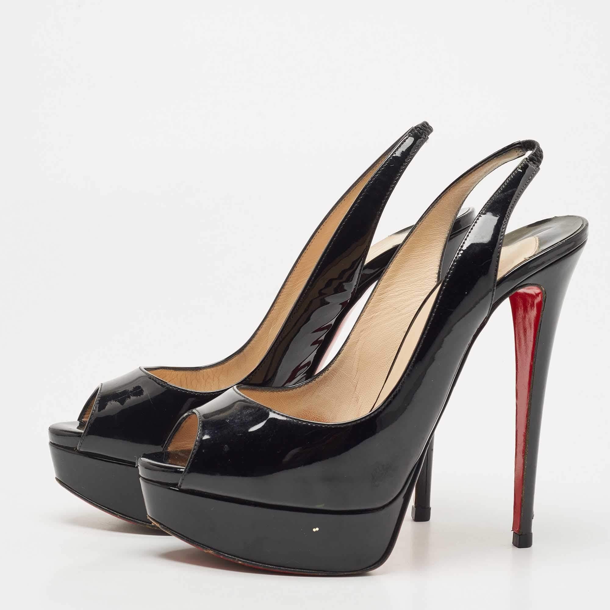 Stand out from the crowd with this classy pair of Louboutins that exude high fashion with class. Crafted from patent leather, this is a creation from their Lady Peep collection. Completed with leather insoles, stiletto heels, and signature