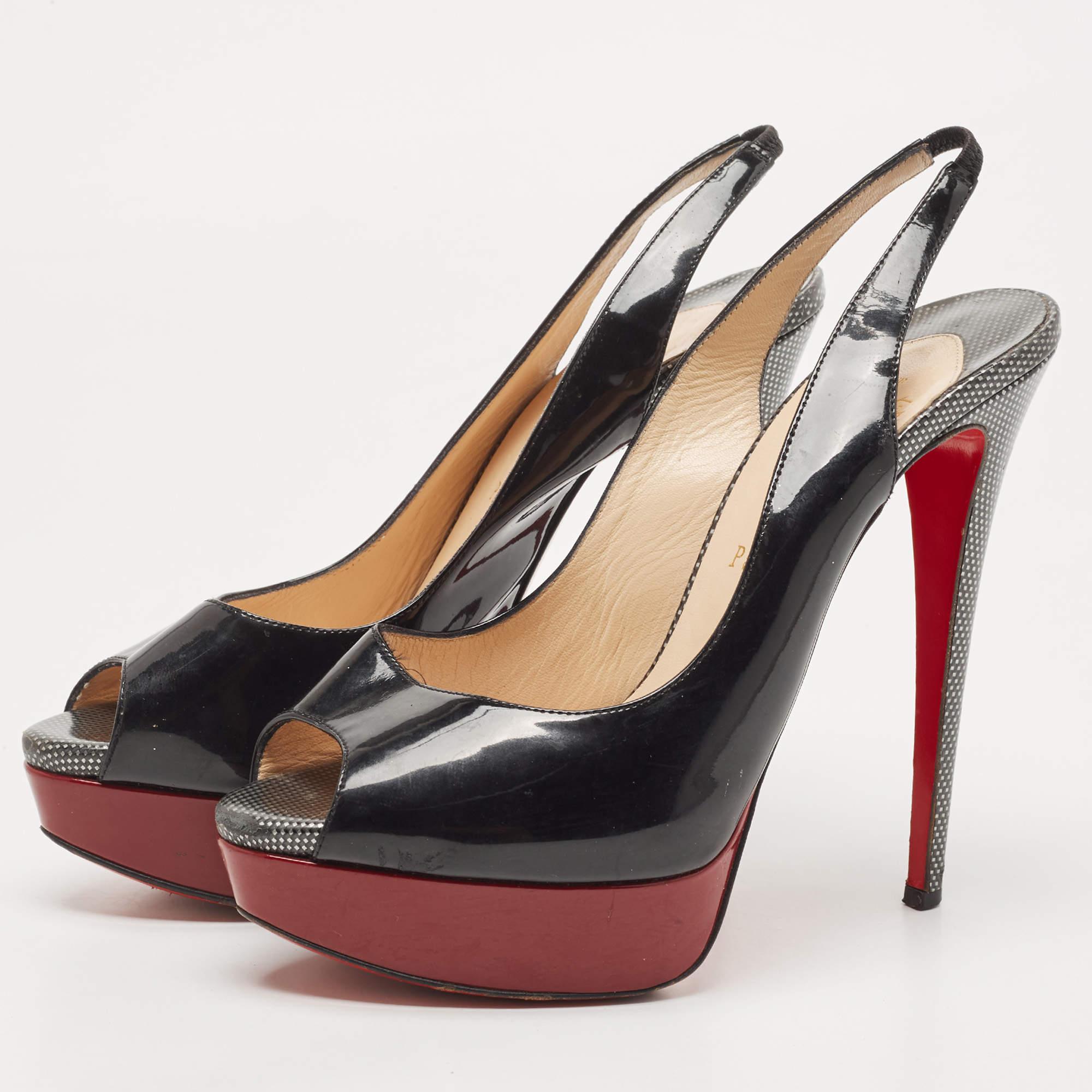 Stand out from the crowd with this luxurious pair of Louboutins that exude high fashion with class. Crafted from patent leather this is a creation from their Lady Peep collection. It features a black shade with peep toes and an architectural shape.