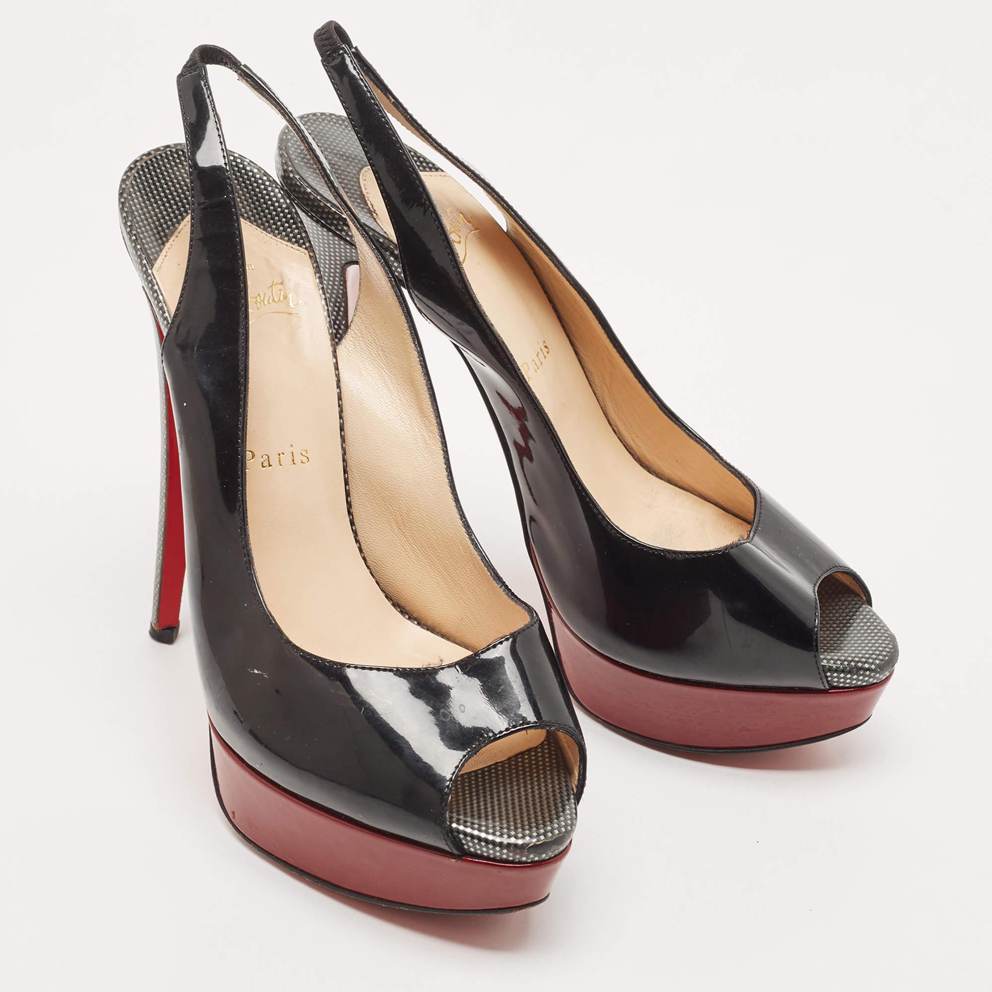 Stand out from the crowd with this luxurious pair of Louboutins that exude high fashion with class. Crafted from patent leather, this is a creation from their Lady Peep collection. It features a black shade with peep toes and an architectural shape.