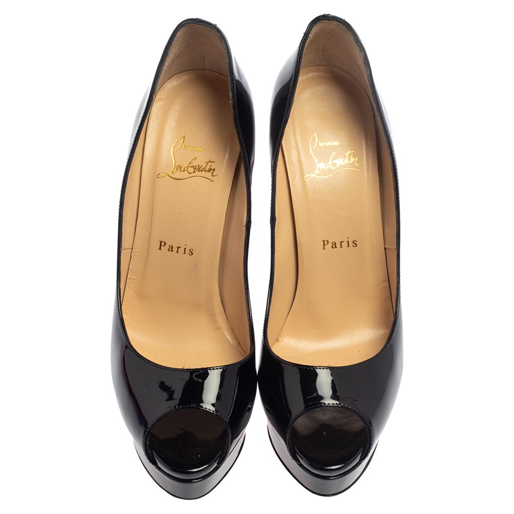 Stand out from a crowd with this gorgeous pair of Louboutins that exude high fashion with class! Crafted from patent leather, this is a creation from their Lady Peep collection. They feature a classic black shade with peep toes and a glossy
