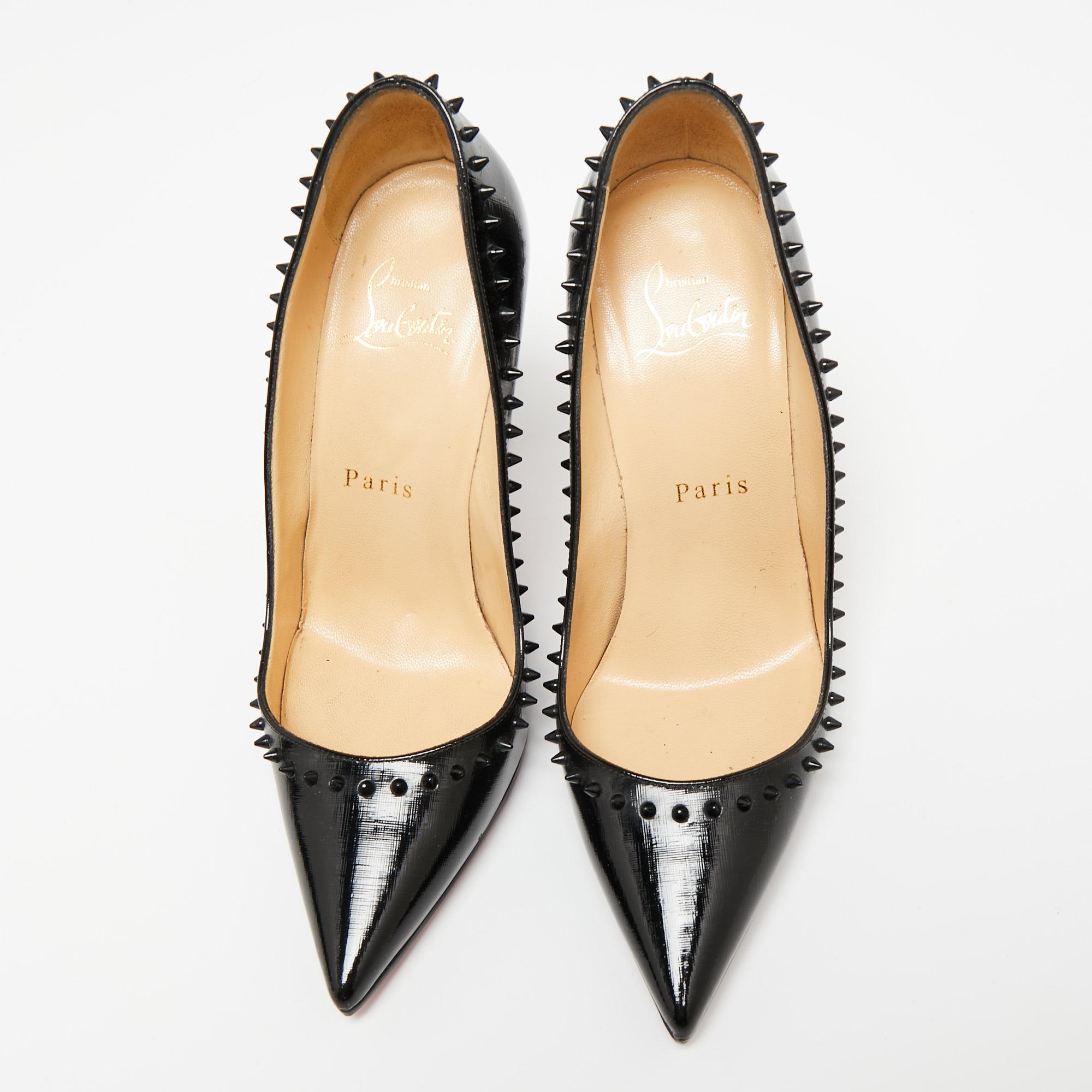 Always setting a benchmark, Christian Louboutin introduces another creation from its enormous collection. These Anjalina pumps look exclusively gorgeous with the spike embellishments in black tone. Crafted with patent leather, this pair has