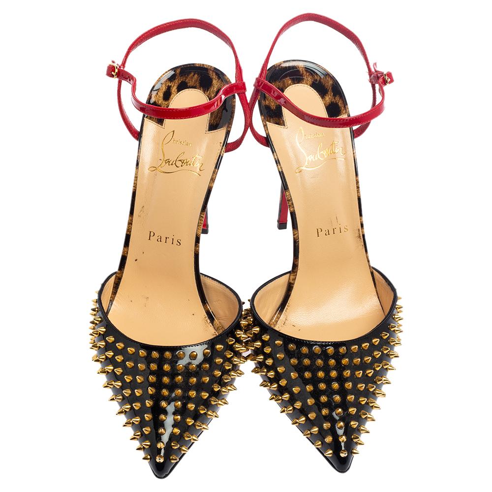 These Baila sandals from the House of Christian Louboutin are the epitome of all things beautiful. Their exterior is designed from black patent leather and embellished with gold-toned Spike accents. It flaunts a contrast ankle-strap detail, slim