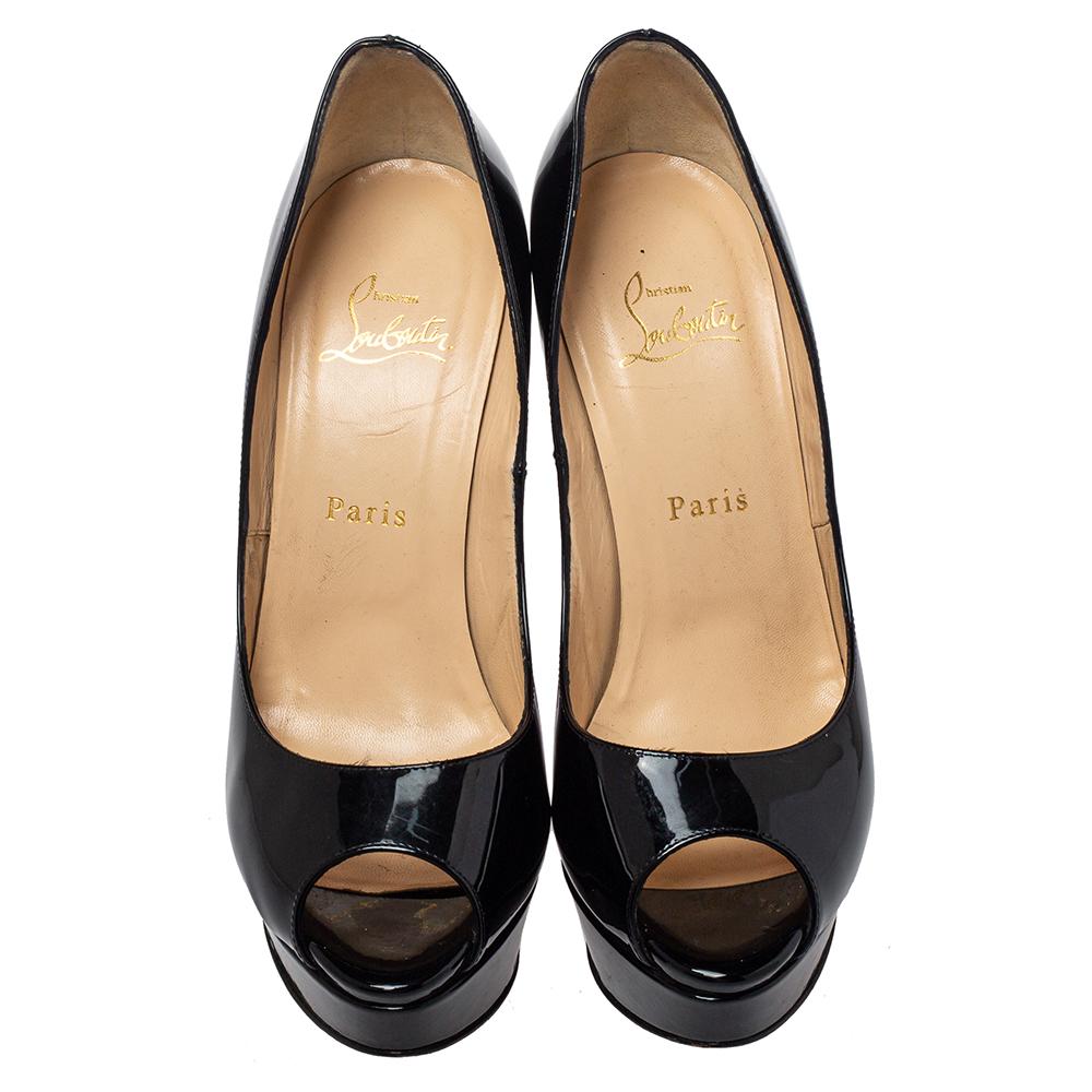 A pair of stunning Christian Louboutin pumps like this one is a closet must-have. Crafted using patent leather, these pumps showcase style and luxury. This pair of black pumps has peep toes, platforms, and well-sculpted heels.

