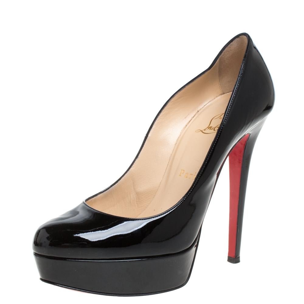 A classic to add to one's shoe collection is this pair. These Christian Louboutin beauties are covered in patent leather and styled with platforms, 13.5 cm heels, and the signature red soles. Add these black pumps to your closet today and flaunt