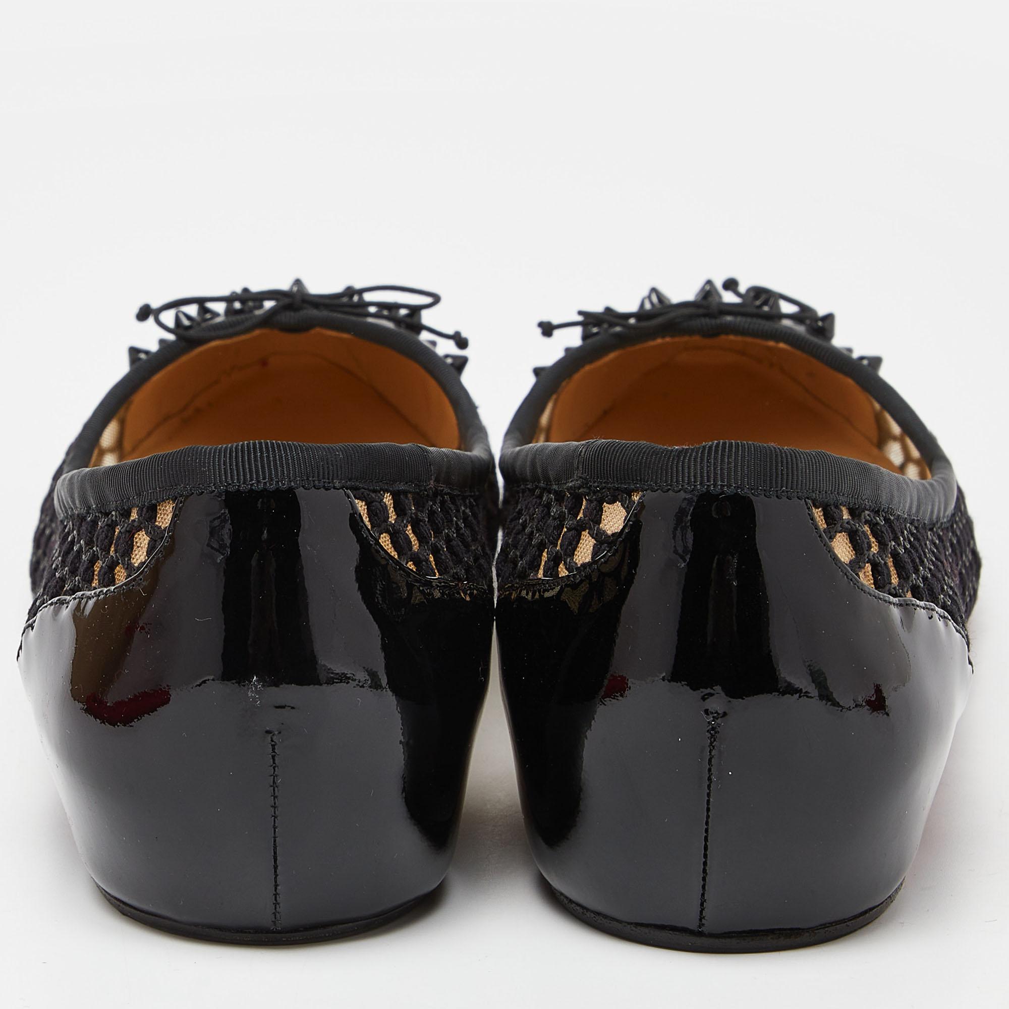 Trendy and very stylish, these ballet flats from Christian Louboutin are a must buy! The black flats have a net-like design and leather cap toes embellished with spikes. Comfortable leather-lined insoles and the signature red-lacquered soles