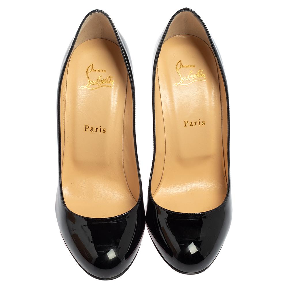 These elegant Christian Louboutin pumps exemplify the skill, style, and expertise of the celebrated brand. Featuring a rounded toe, these pumps are beautifully fashioned in black patent leather. Wear these for the office or for a dinner date –