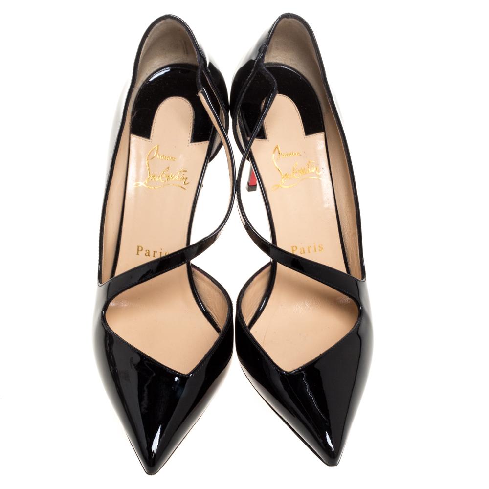 Designed with feminine aesthetics and exuding elegance, these Christian Louboutin pumps come crafted from black patent leather. They have been styled with pointed toes, cross straps on the vamps and 9 cm stiletto heels. They are complete with