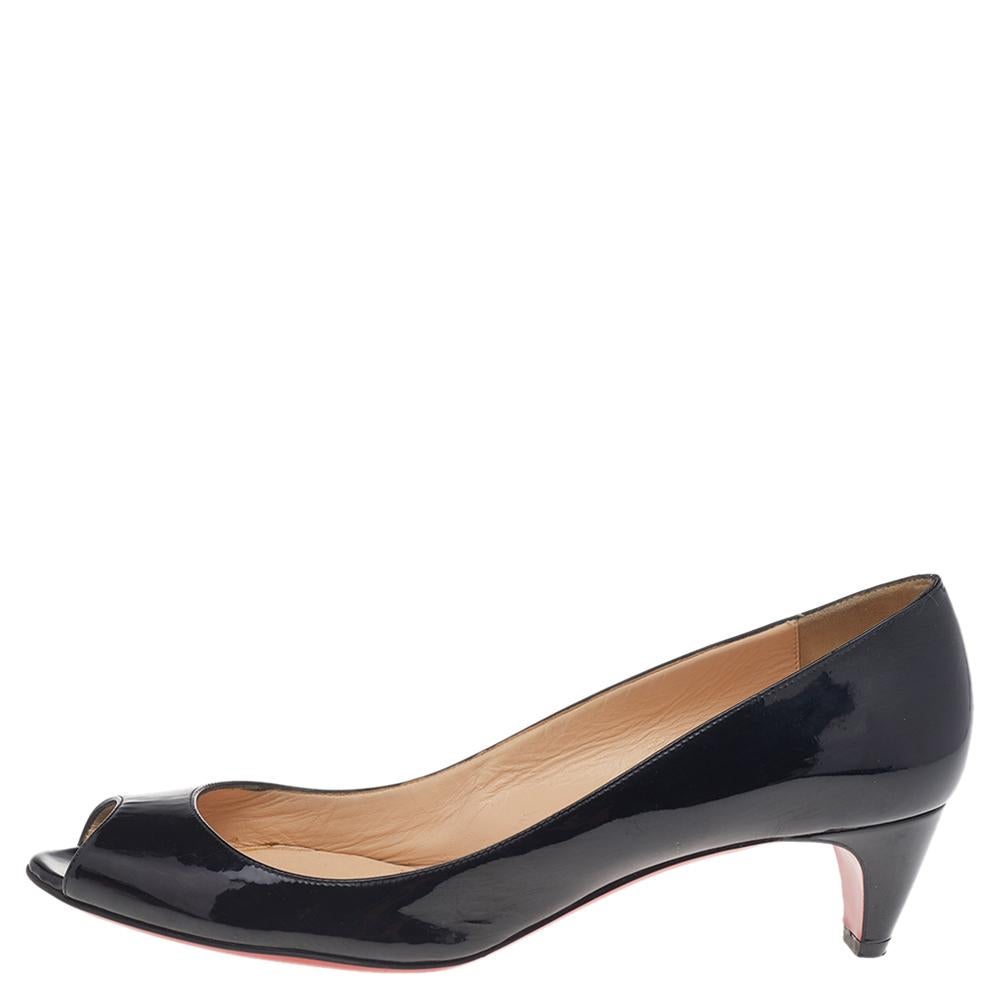 You'll love the striking style carried by these black patent leather pumps from Christian Louboutin. They flaunt peep toes, 5 cm kitten heels, and the signature red soles.