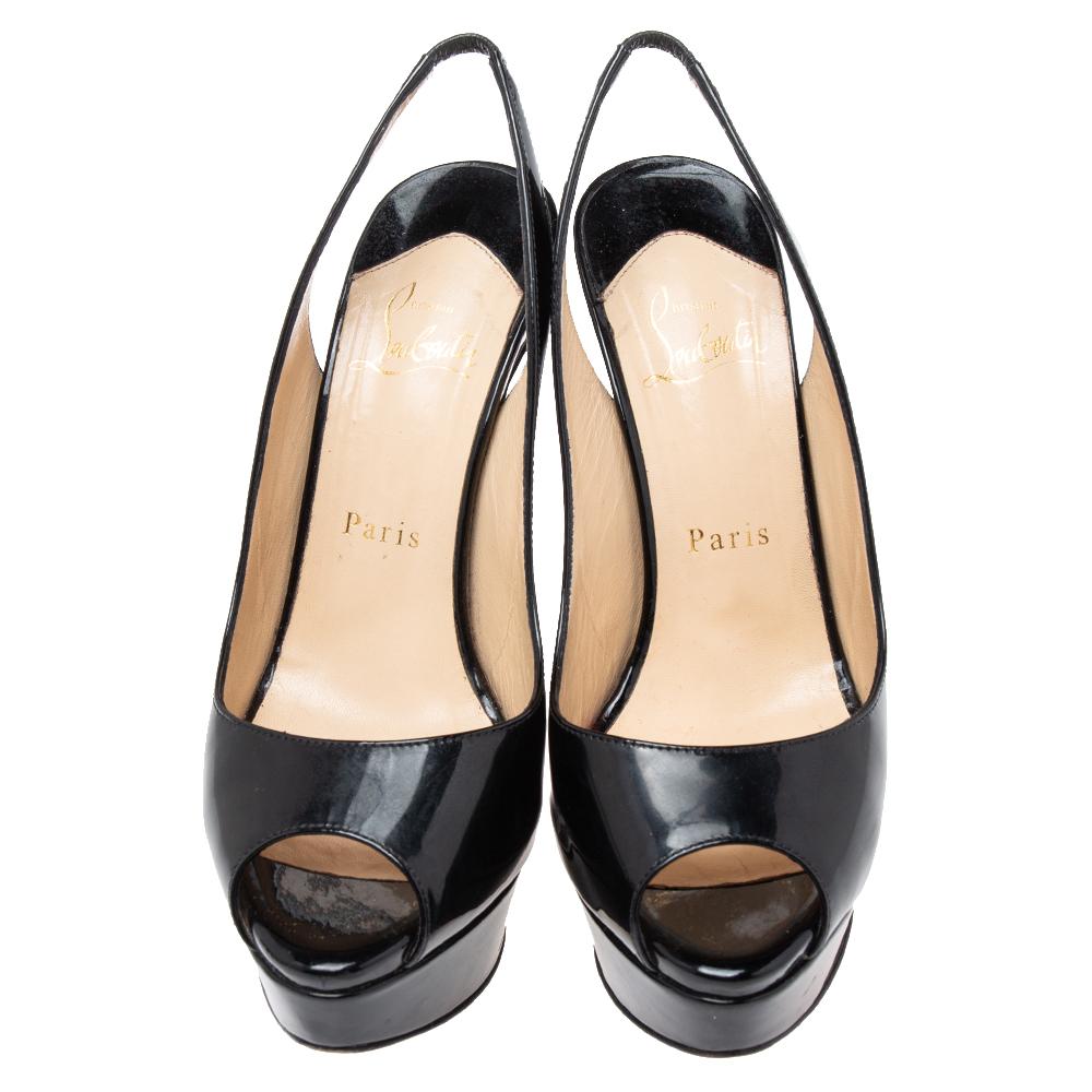 This beautiful pair of CL peep-toe pumps will bring you a confident, comfortable walk. Crafted from black patent leather and lifted on platforms and 14 cm heels, these uber-stylish slingback shoes are perfect for any season. The Christian Louboutin