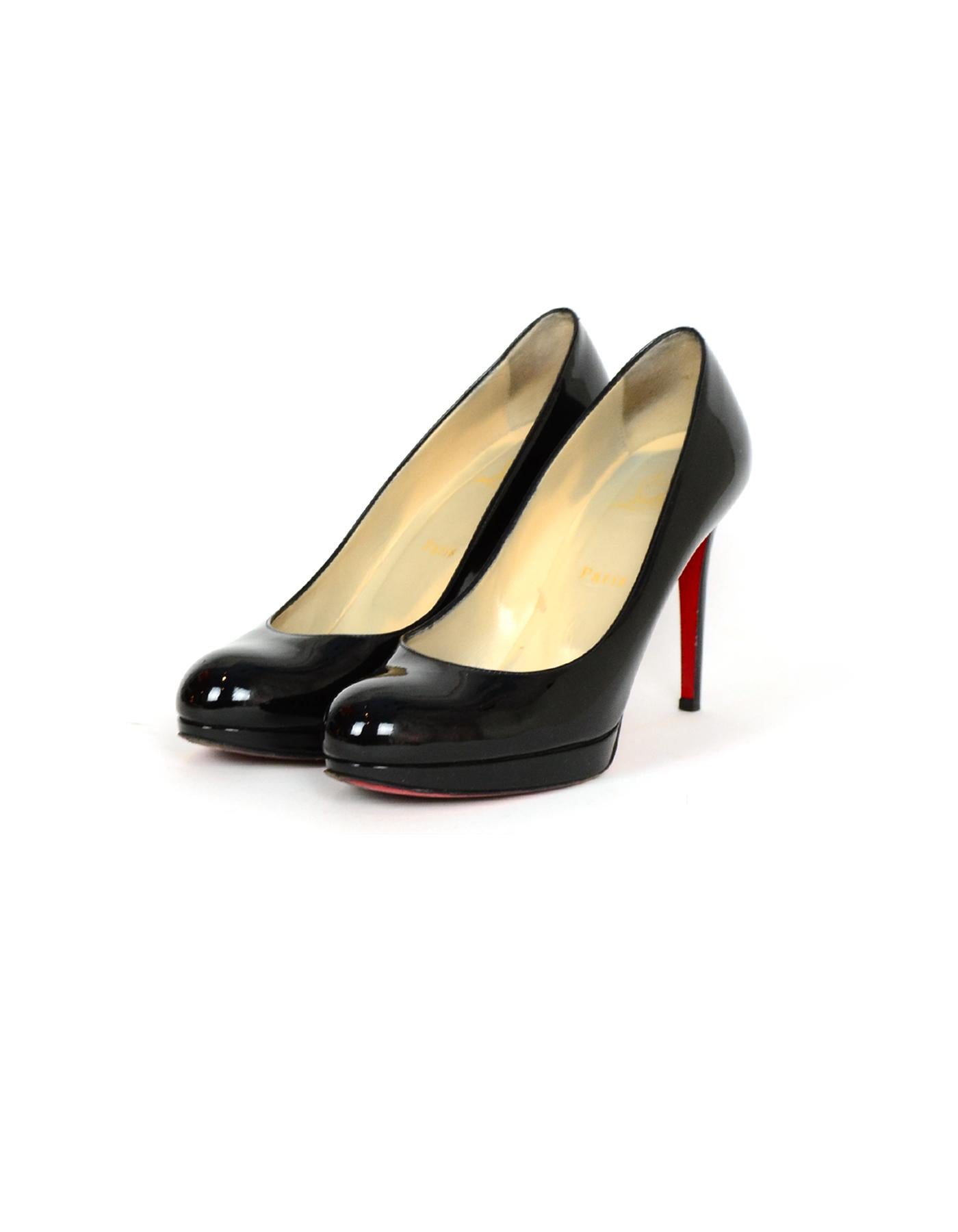 Christian Louboutin Black Patent Leather New Simple 100 Pumps sz 38.5

Made In: Italy
Color: Black
Materials: Patent Leather
Closure/Opening: Slide on
Overall Condition: Very good pre-owned condition, color transfer on insoles and wear to soles.