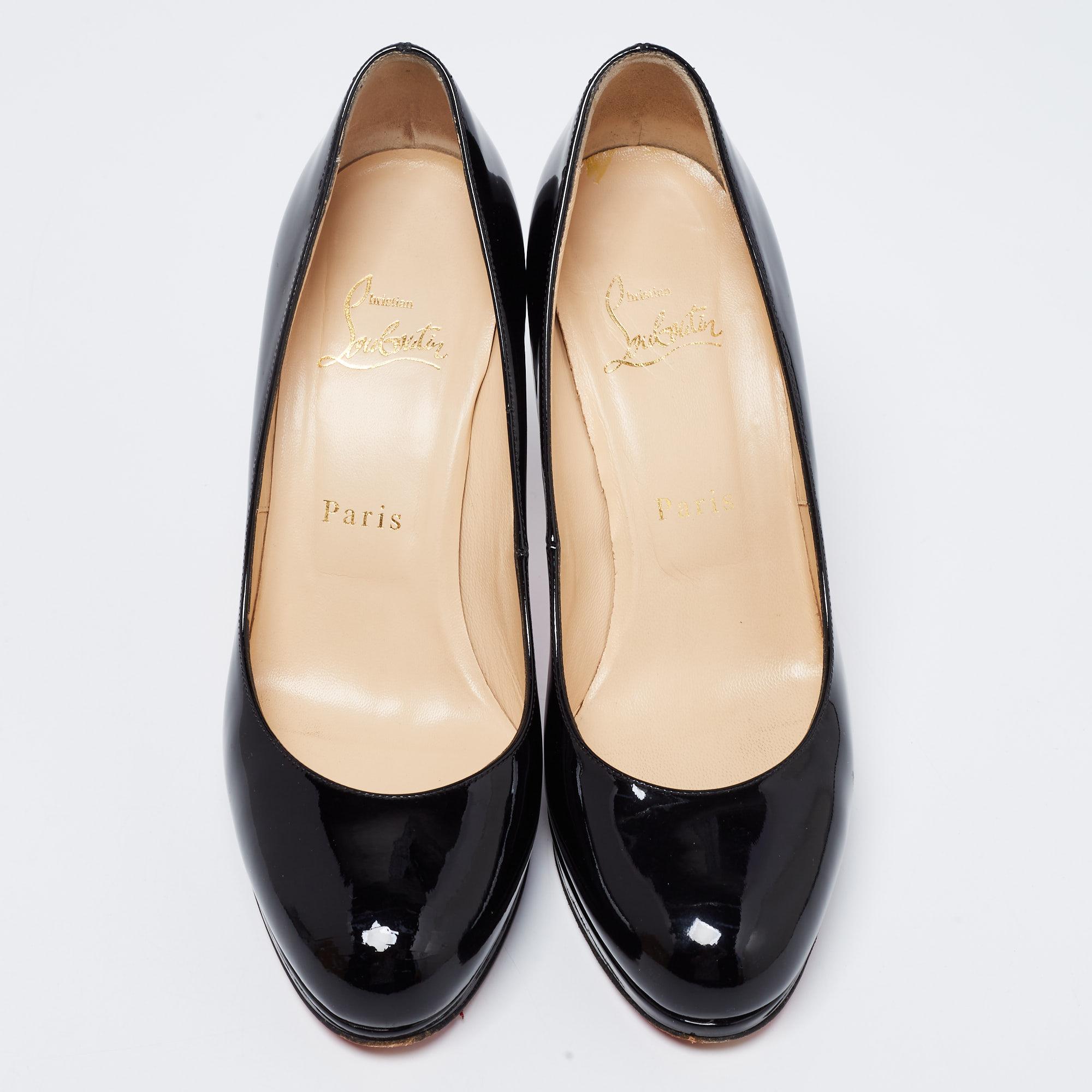 Escape the monotonous designs and move on to classy styles like these New Simple pumps from Christian Louboutin. They showcase a chic silhouette crafted from black patent leather. They are finished with rounded toes, platforms, and pointy 10 cm