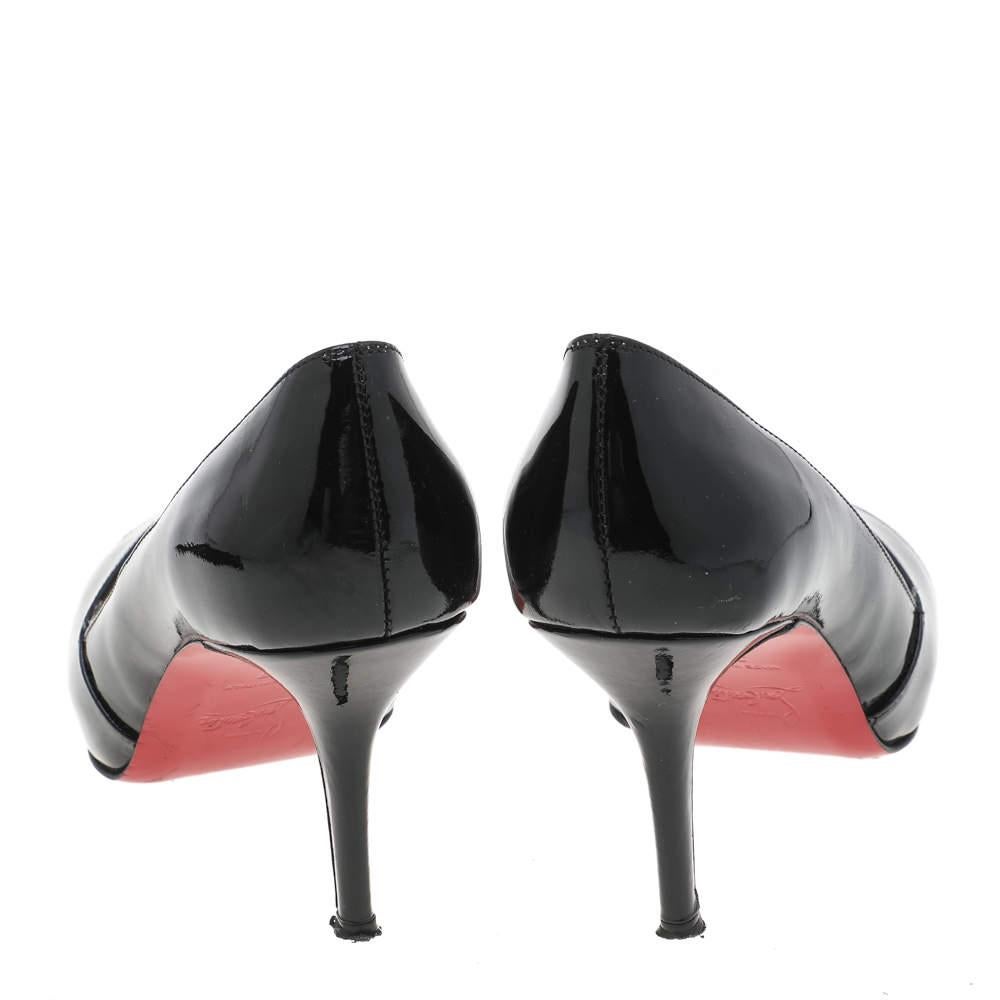 These Shelley pumps from the House of Christian Louboutin are truly the best buy! They are crafted using black patent leather and feature open toes, a slip-on style, and slender heels. They display the iconic red-lacquered soles. These CL pumps will