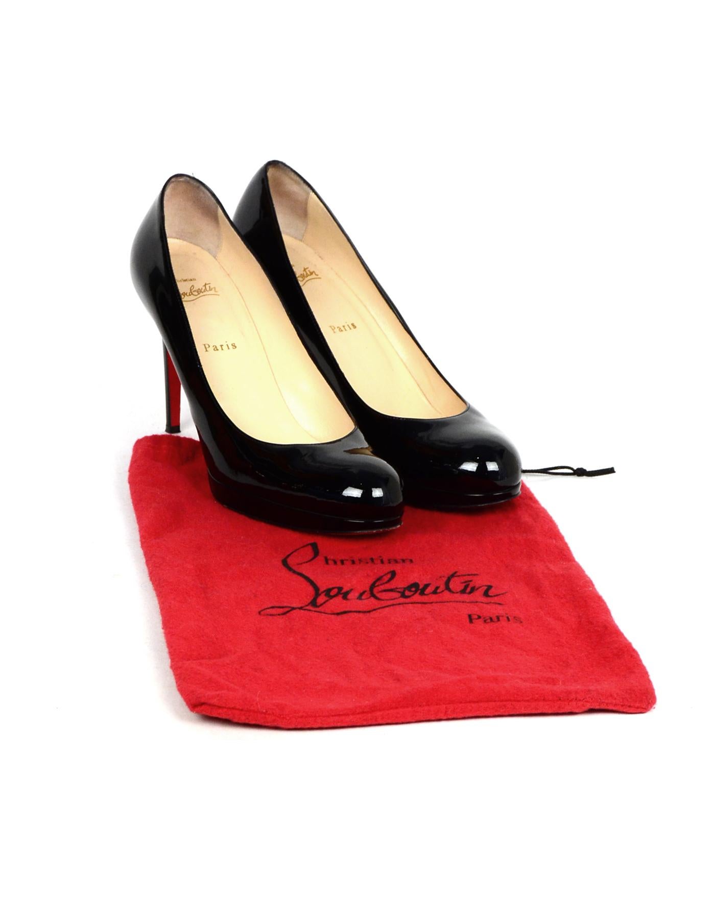 Christian Louboutin Black Patent Leather Simple Pump Sz 41 W/ DB

Made In: Italy
Color: Black
Materials: Patent leather
Closure/Opening: Slide on
Overall Condition: Excellent pre-owned condition with exception of some scuffing in patent leather