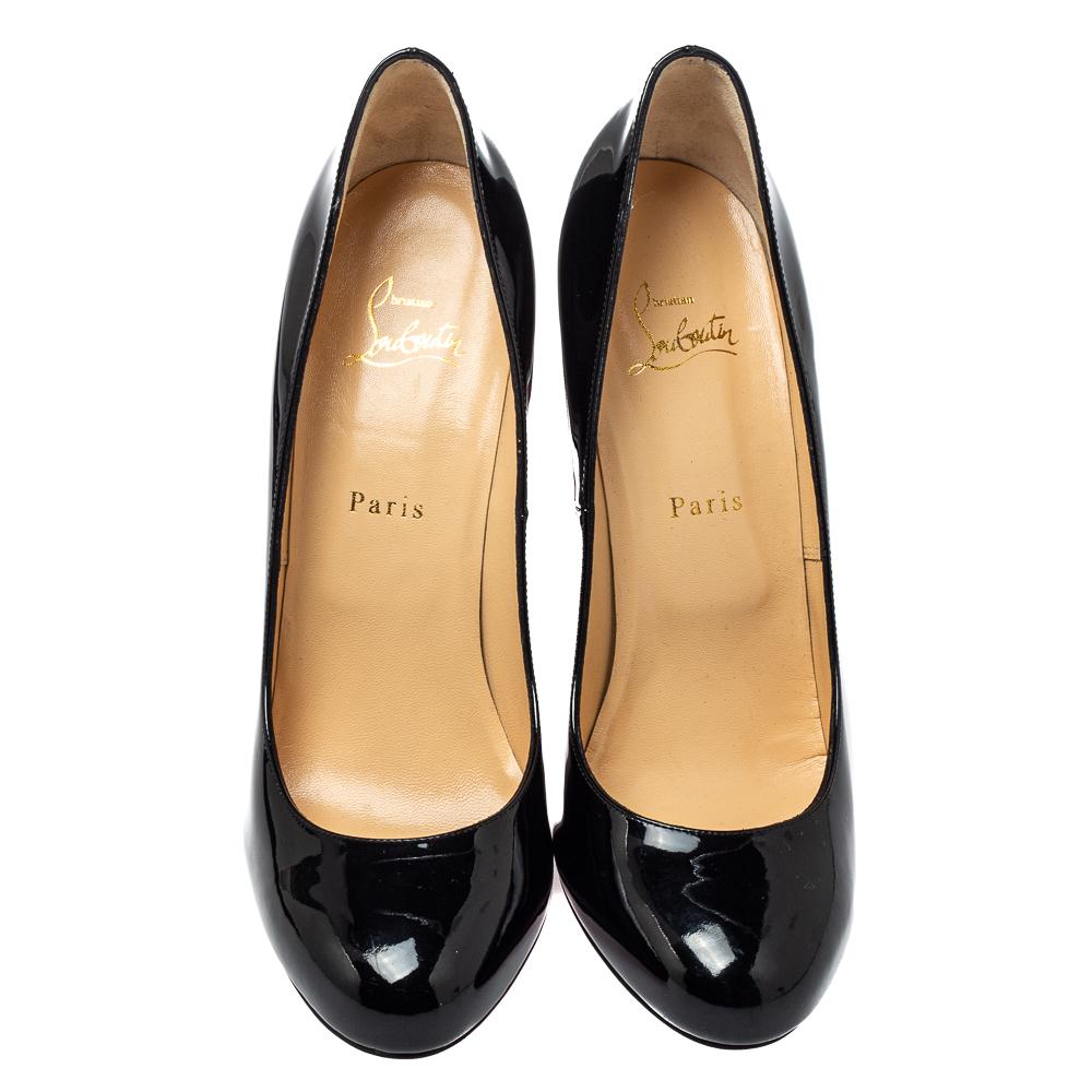 Louboutins are designed to lift one's attitude and outfit. Let this pair lift yours as well by owning them today. Crafted from patent leather, these black pumps carry covered toes and a sleek silhouette. Completed with 13 cm heels and the signature