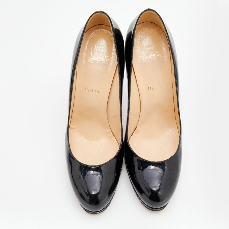 Louboutins are designed to lift one's attitude and outfit. Let this pair lift yours as well by owning them today. Crafted from patent leather, these black pumps carry covered toes and a sleek silhouette. Completed with 12 cm heels and the signature