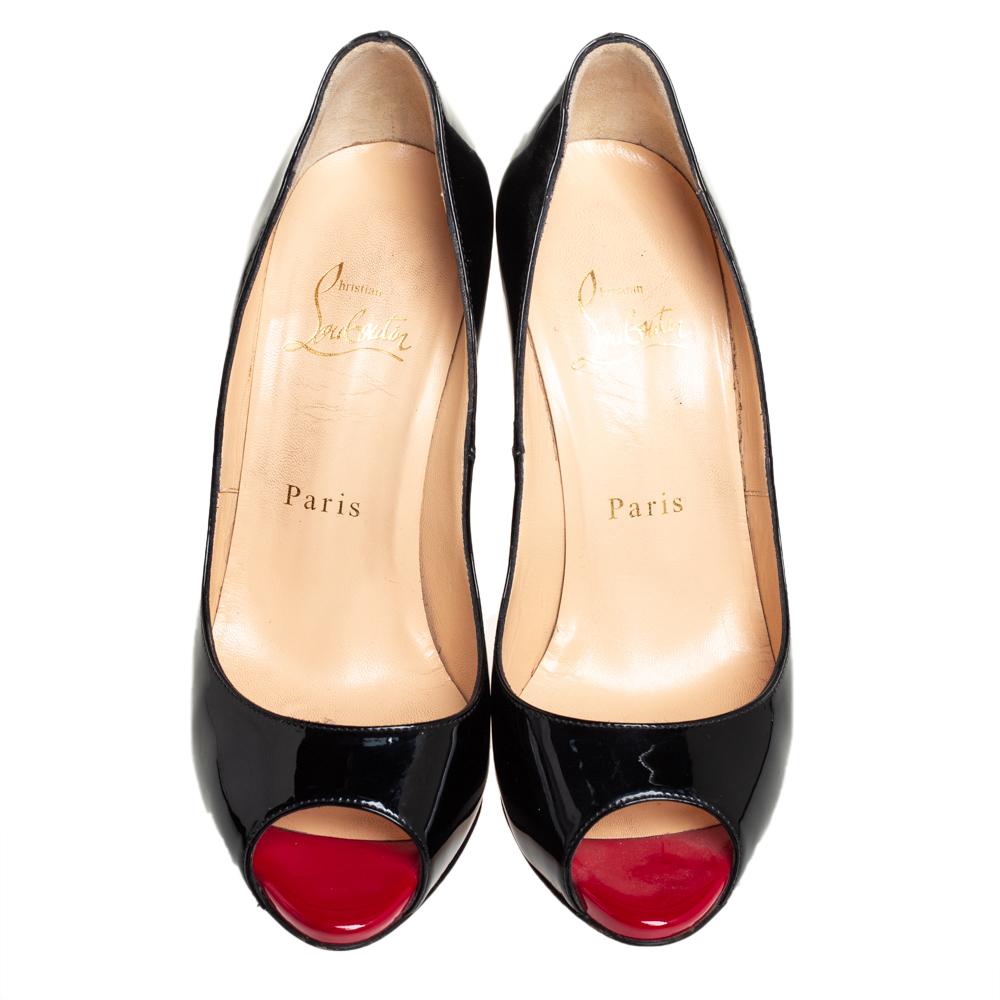 Christian Louboutin's Very Prive pumps exude a timeless and sophisticated appeal that works well with most outfits. Crafted in Italy from patent leather in a black shade, they feature peep toes and are elevated on 11.5 cm stiletto heels supported by