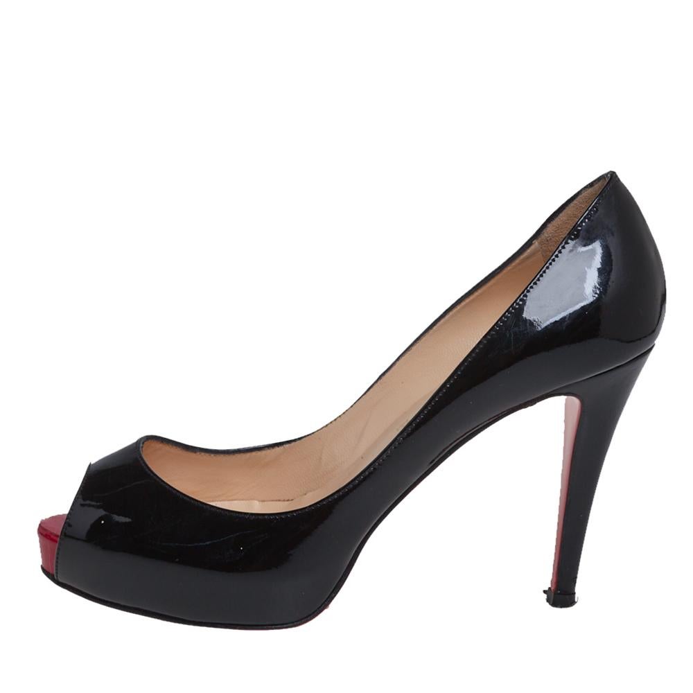Christian Louboutin's Very Prive pumps exude a timeless and sophisticated appeal that works well with most outfits. Crafted in Italy from patent leather in a black shade, they feature peep toes and are elevated on 9.5 cm stiletto heels supported by
