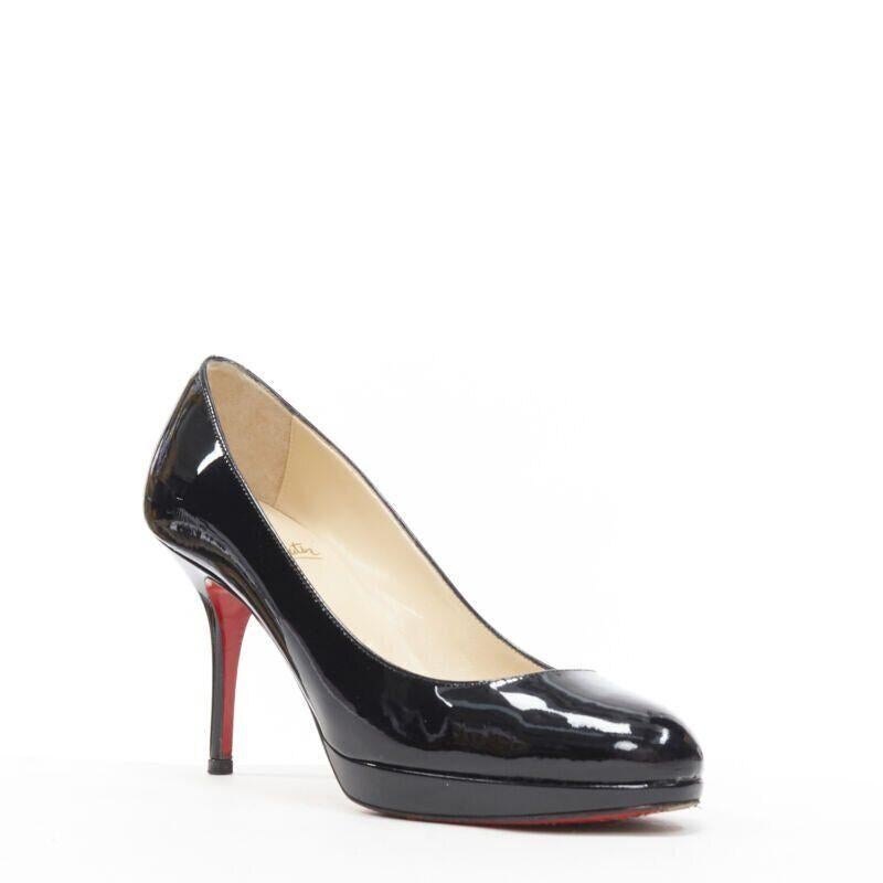 CHRISTIAN LOUBOUTIN black patent platform round toe high heel pump EU36 US6
Reference: TGAS/A05348
Brand: Christian Louboutin
Model: Platform pump
Material: Leather
Color: Black
Pattern: Solid
Made in: Italy

CONDITION:
Condition: Good, this item