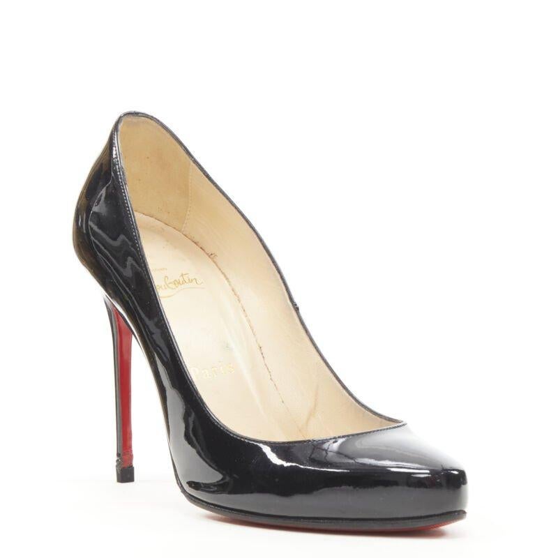 CHRISTIAN LOUBOUTIN - Escarpins classiques à pointe arrondie en brevet noir EU38,5
Référence : KEDG/A00129
Marque : Christian Louboutin
MATERIAL : Cuir verni
Couleur : Noir
Motif : Solide
Doublure :  Cuir
Détails supplémentaires : Pointe arrondie.