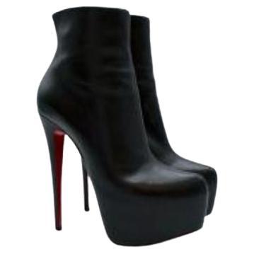 Used louboutin boots top