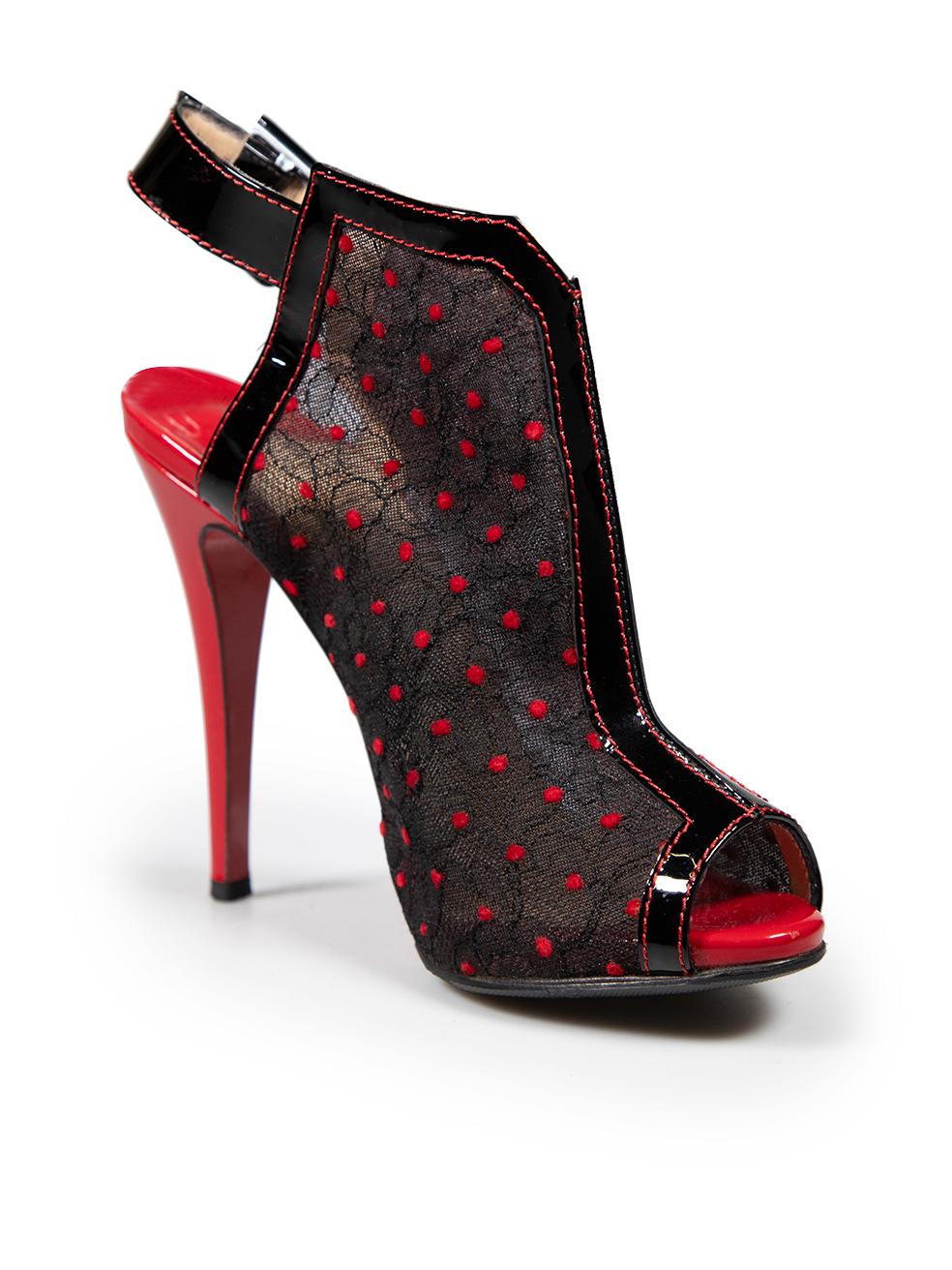 CONDITION is Good. Minor wear to heels is evident. These heels have been resoled. There is a small abrasion on the end of the left heels toe bed. There are small gold markings along the left heel on this used Christian Louboutin designer resale