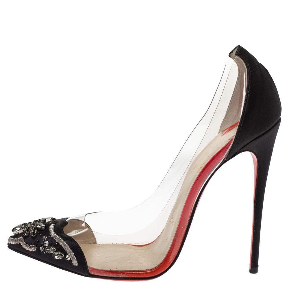 Step out in sophistication and style when you wear this pair of stylish Christian Louboutin pumps. Make a statement while and watch as heads turn when you walk into the room. Crafetd from PVC and satin, they come in a black hue. They are styled with