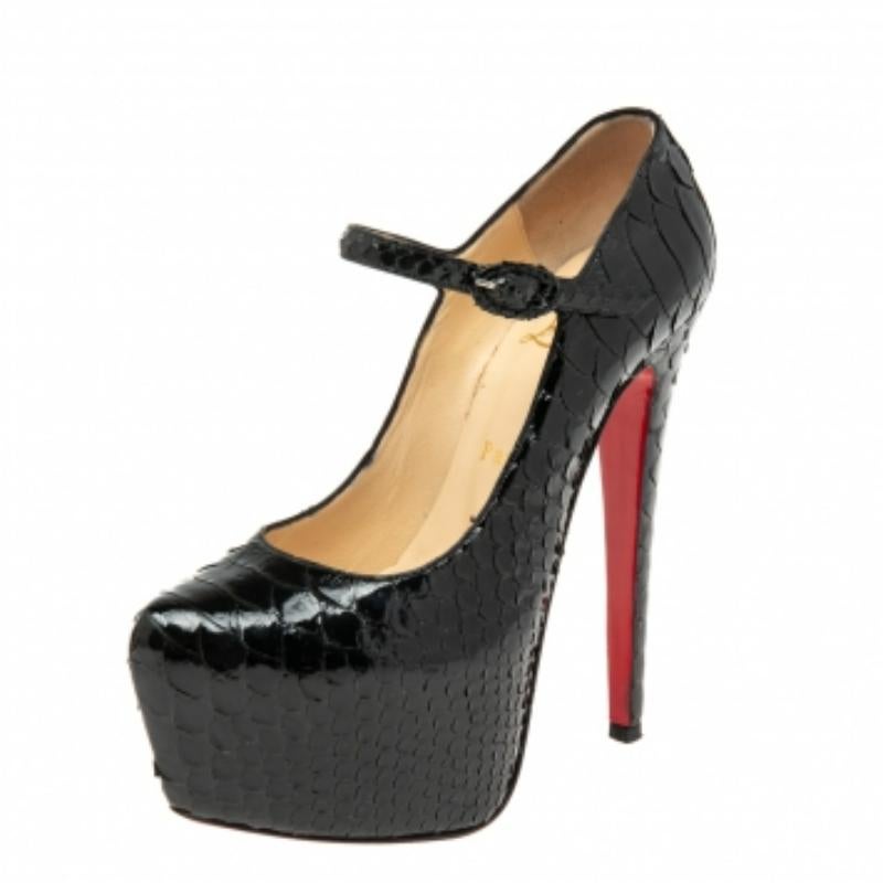 Take your love for Louboutins to new heights by adding this gorgeous pair to your collection. The pumps simply speak high fashion in every stitch and curve. The exteriors come made from python leather and the pumps are finished with platforms, 15 cm