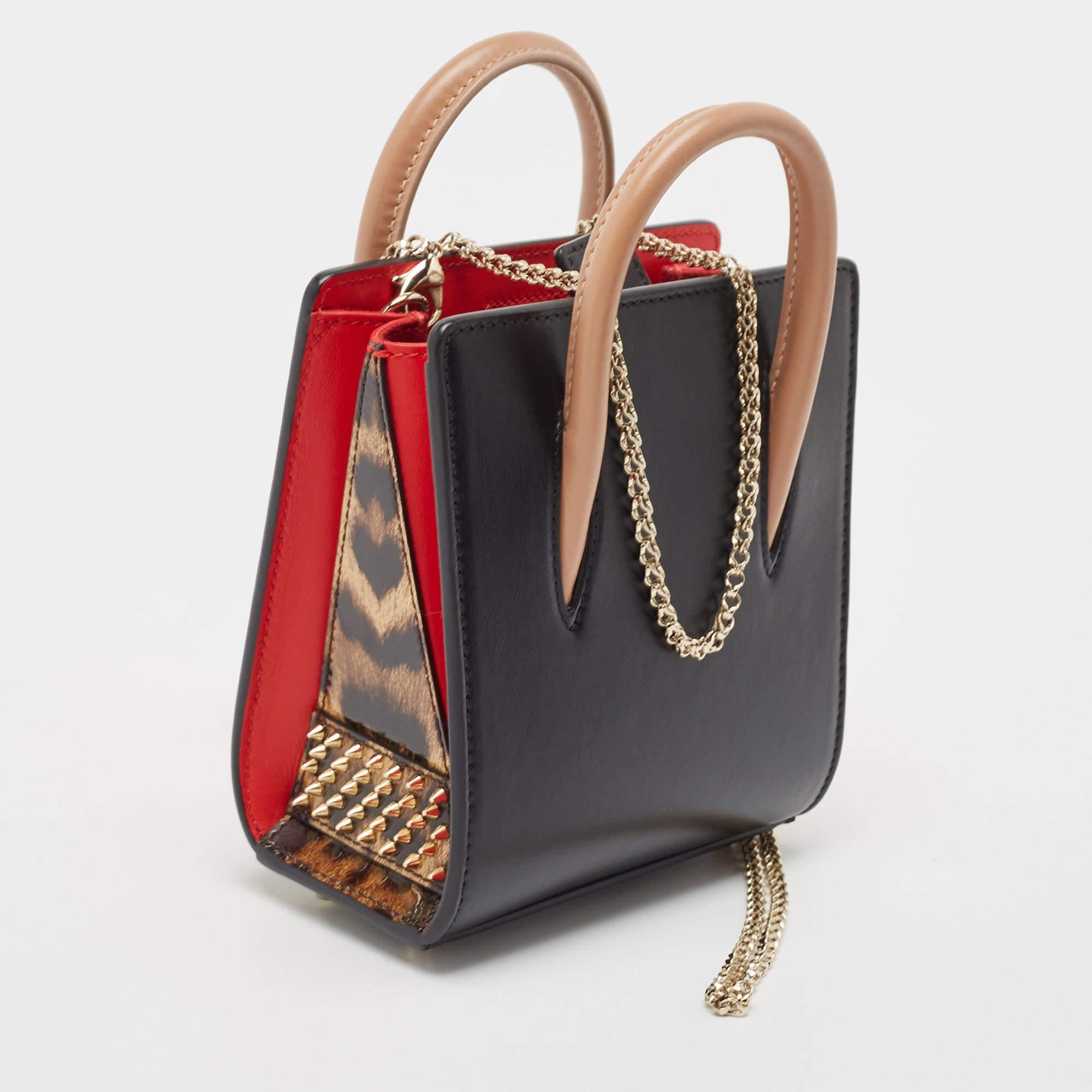 This Christian Louboutin tote is a result of blending high crafting skills with a practical design. It arrives in a durable exterior and is completed by luxe detailing. It is an accessory that you can count on.

