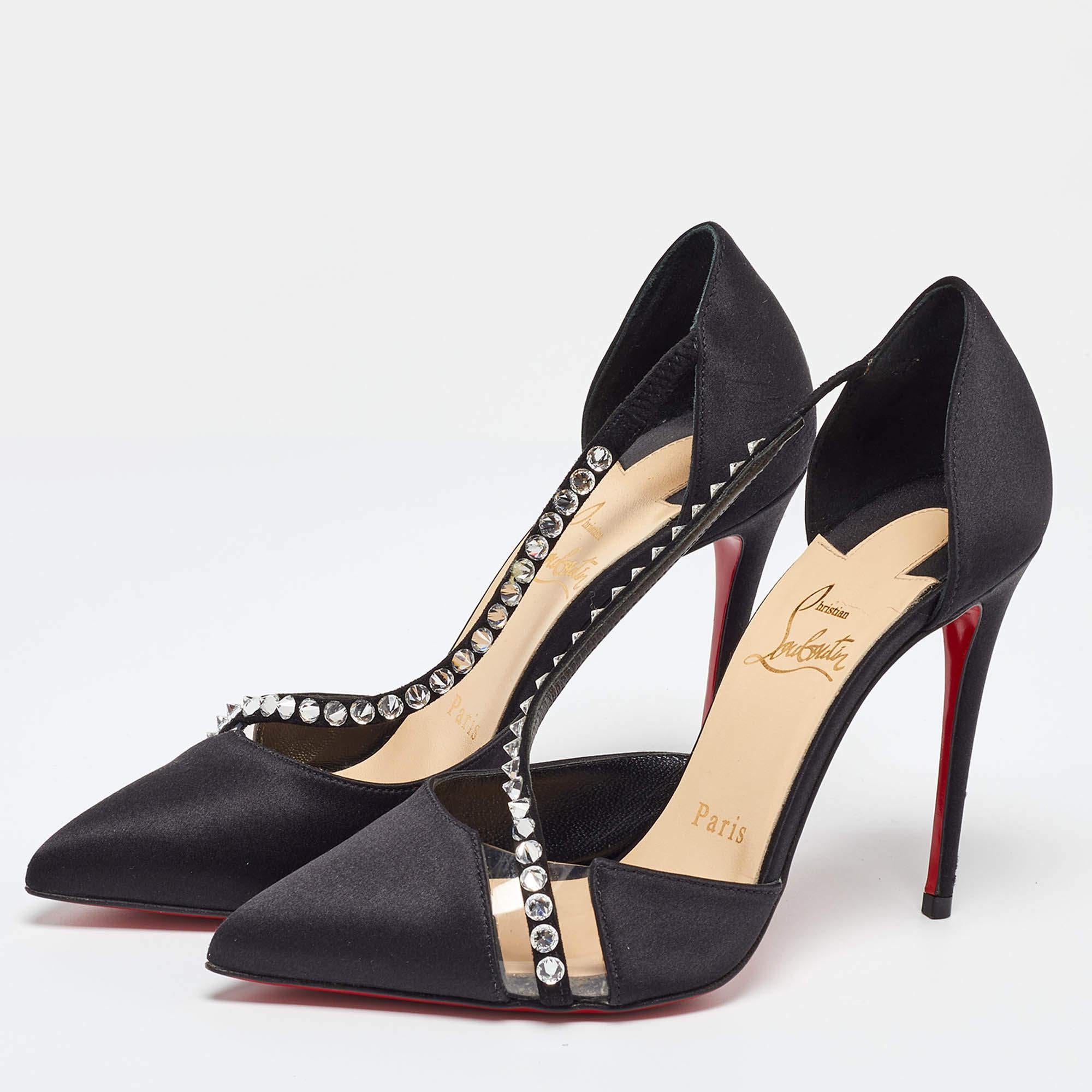 Combining boldness with modernity Christian Louboutin's black pumps are inspired by the creative expression of street art. Crafted in leather they feature PVC panels and straps decorated with crystals. Wear these stiletto heel pumps to elevate a