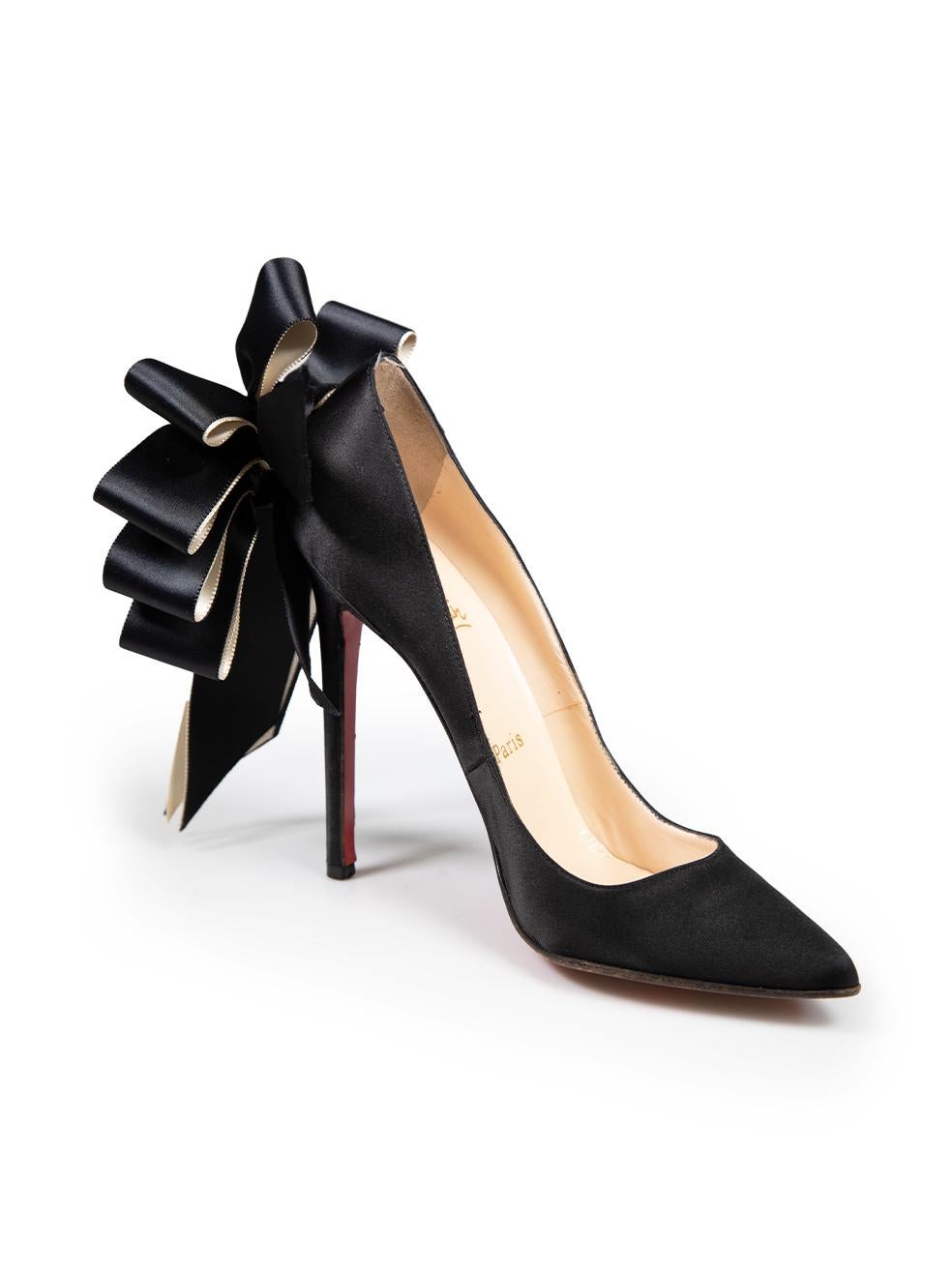 CONDITION is Good. Minor wear to pumps is evident. Light wear is seen to both shoes have discolouration on the tip of the toe and a there are marks and creasing to the insoles. There are small marks to the underside of the ribbon on this used