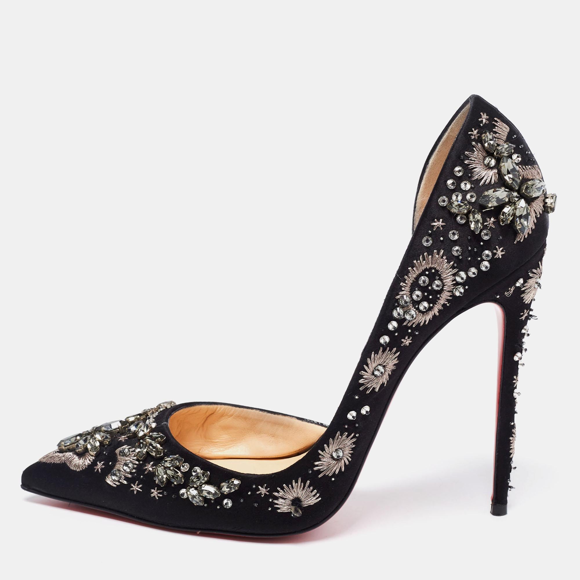 How elegantly stunning are these D'orsay pumps from Christian Louboutin! Crafted from plush satin, the luxurious pair flaunts magnificent embellishments all over and have pointed-toes. The statement pumps are complete with leather-lined insoles and