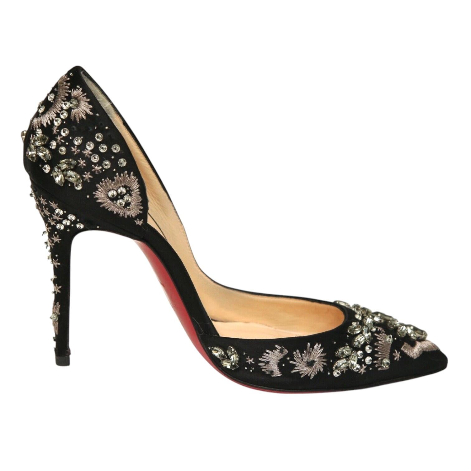 CHRISTIAN LOUBOUTIN BLACK SATIN ARTIFICE SATIN PUMPS

Retailed excluding sales taxes $2,365.

Design:
- Black satin uppers with crystals and embroidery.
- D'Orsay style.
- Slip on.
- Self-covered heel.
- Leather lining.
- Signature red leather