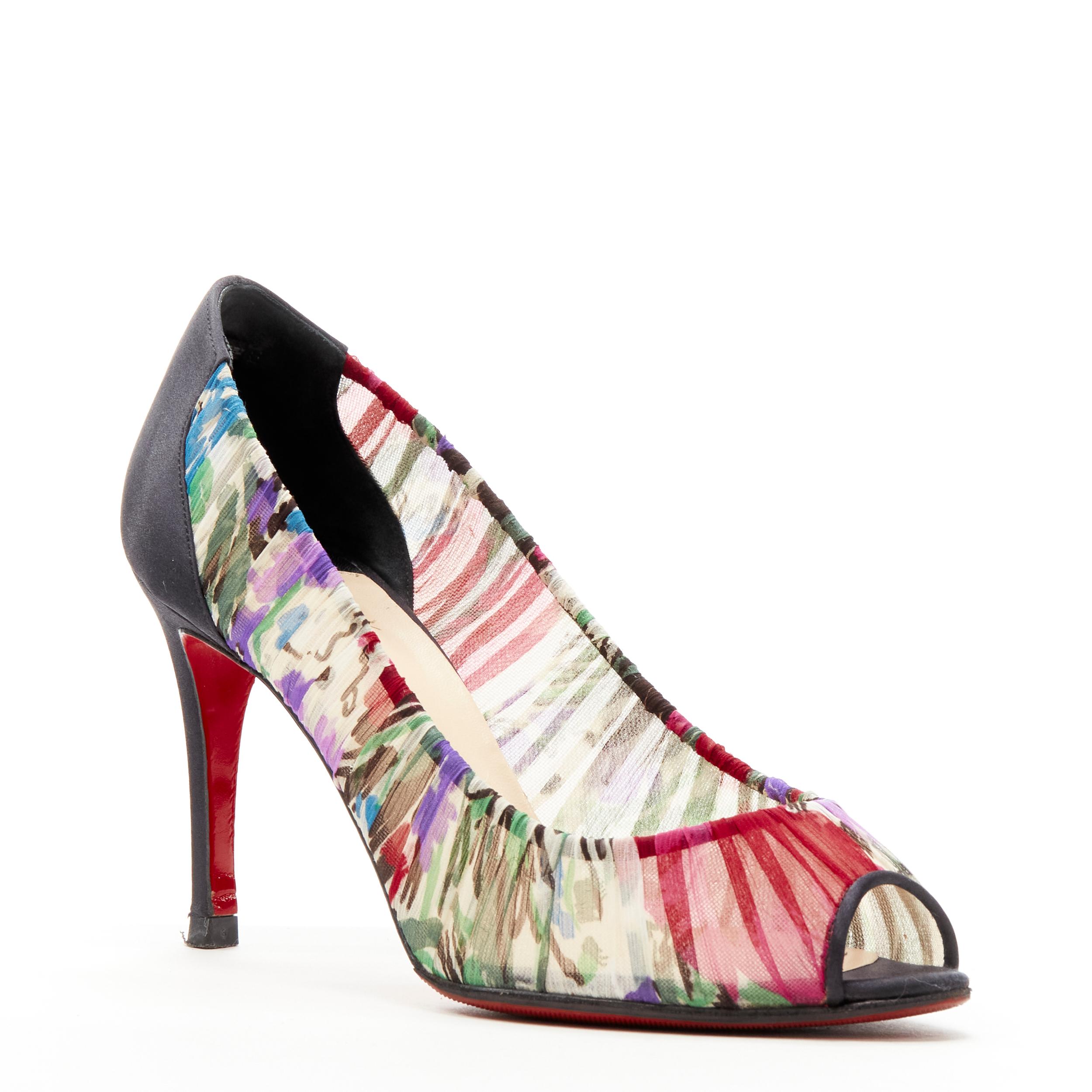 CHRISTIAN LOUBOUTIN black satin sheer floral peep toe heel EU37
Reference: ANWU/A00179 
Brand: Christian Louboutin 
Material: Fabric 
Color: Multicolour 
Pattern: Floral 
Made in: Italy 


CONDITION: 
Condition: Very good, this item was pre-owned