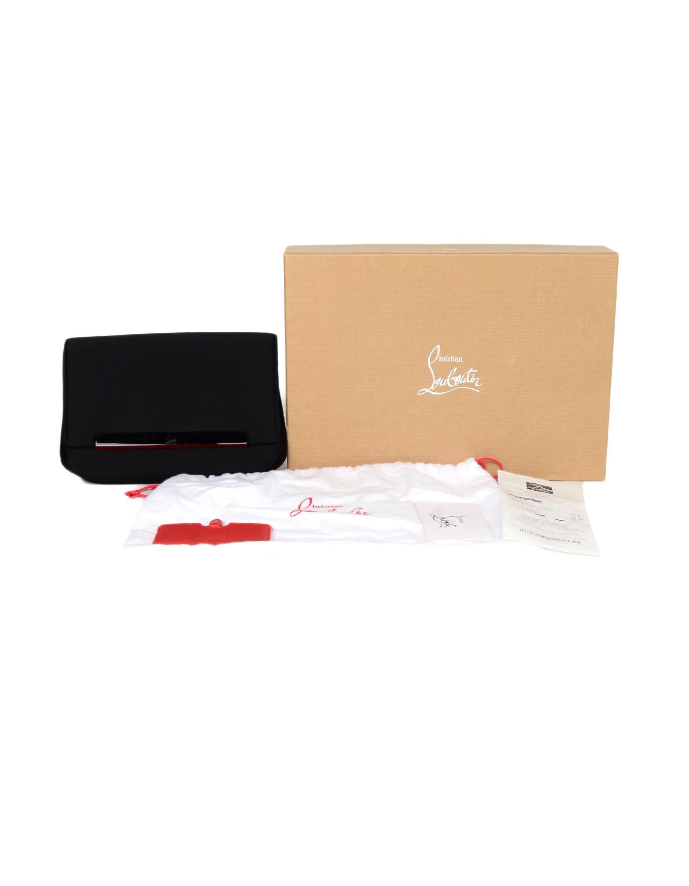 Christian Louboutin Black Satin Small Rougissime Clutch Bag

Made In: Italy
Color: Black
Hardware: Black, red
Materials: Satin, metal
Lining: Red satin 
Closure/Opening: Flap top with magnetic closure
Exterior Pockets: Rear magnetic pocket
Interior