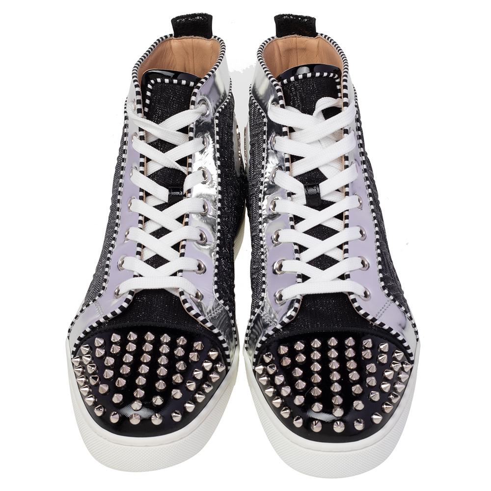You'll leave your friends amazed every time you step out in these Orlato sneakers from Christian Louboutin! These sneakers are crafted from leather and woven fabric and feature round toes with multiple spikes detailed on them. They flaunt lace-ups