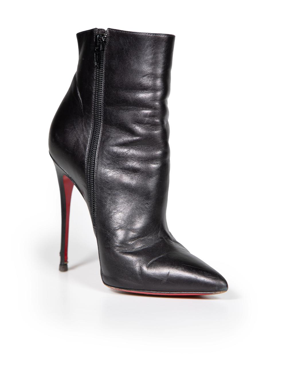 CONDITION is Good. Minimal wear to boots is evident. Minimal wear to the front is seen with general creasing to the leather with abrasion marks on the heels and pointed toe of both shoes on this used Christian Louboutin designer resale item.
 
 
 
