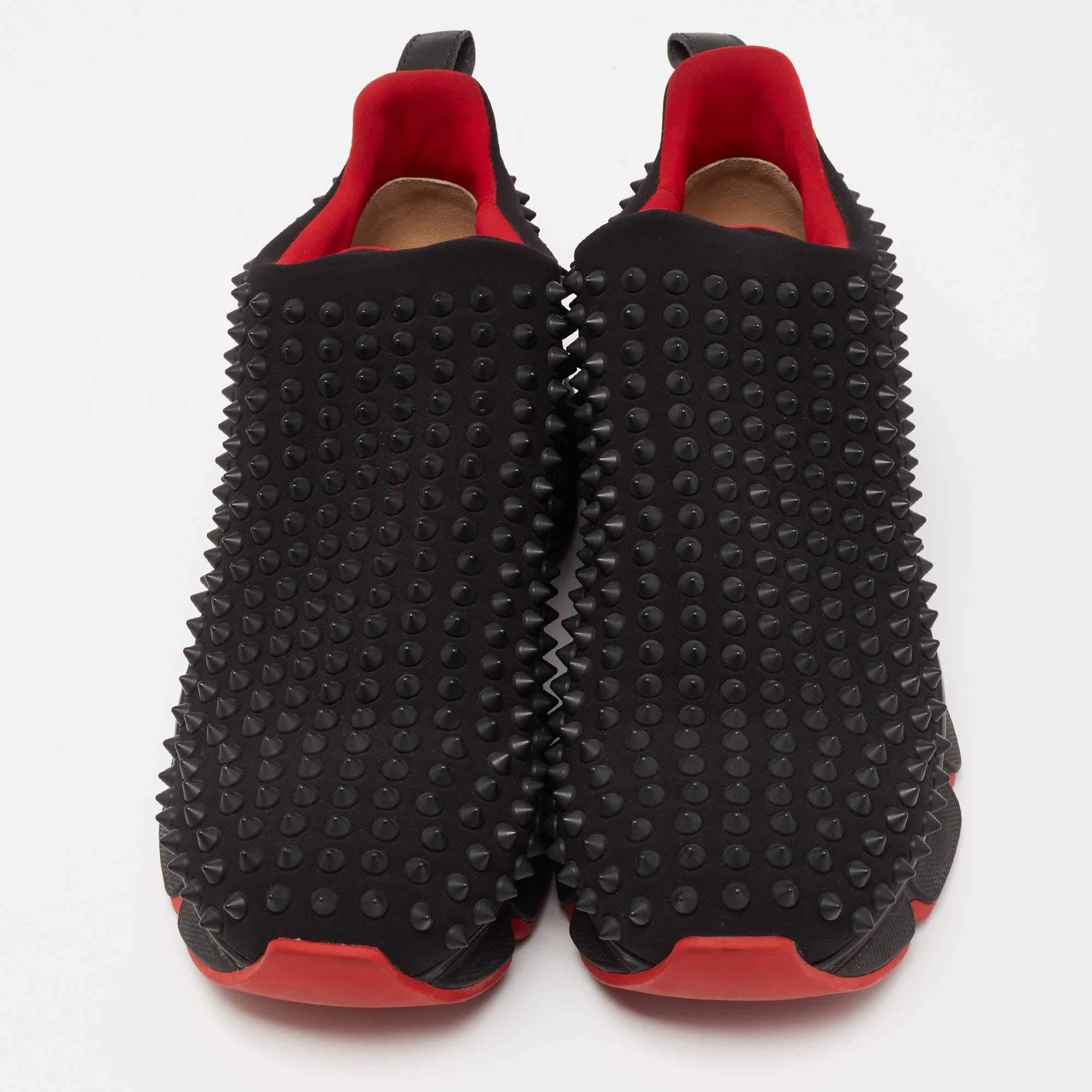 Sporty, luxe, and stylish, these Christian Louboutin sneakers are stunning to look at and will create a statement when paired with your street-style ensemble. They are made from fabric in a black shade and detailed with tonal spikes densely placed