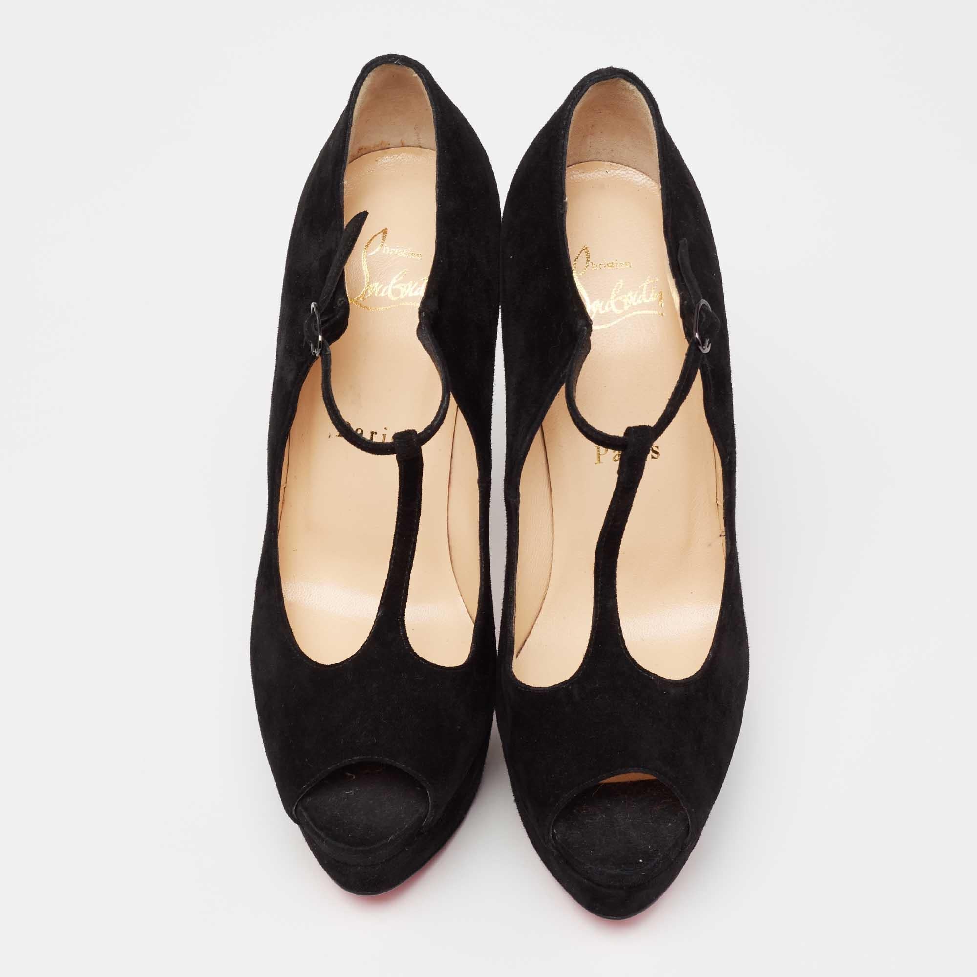 Christian Louboutin's feminine and classy pair of black T-strap pumps are made from smooth suede. The pair features a peep-toe style with peep-toes. The Alta Poppins pumps have comfortable leather-lined insoles. Pair this up with dresses for a dose