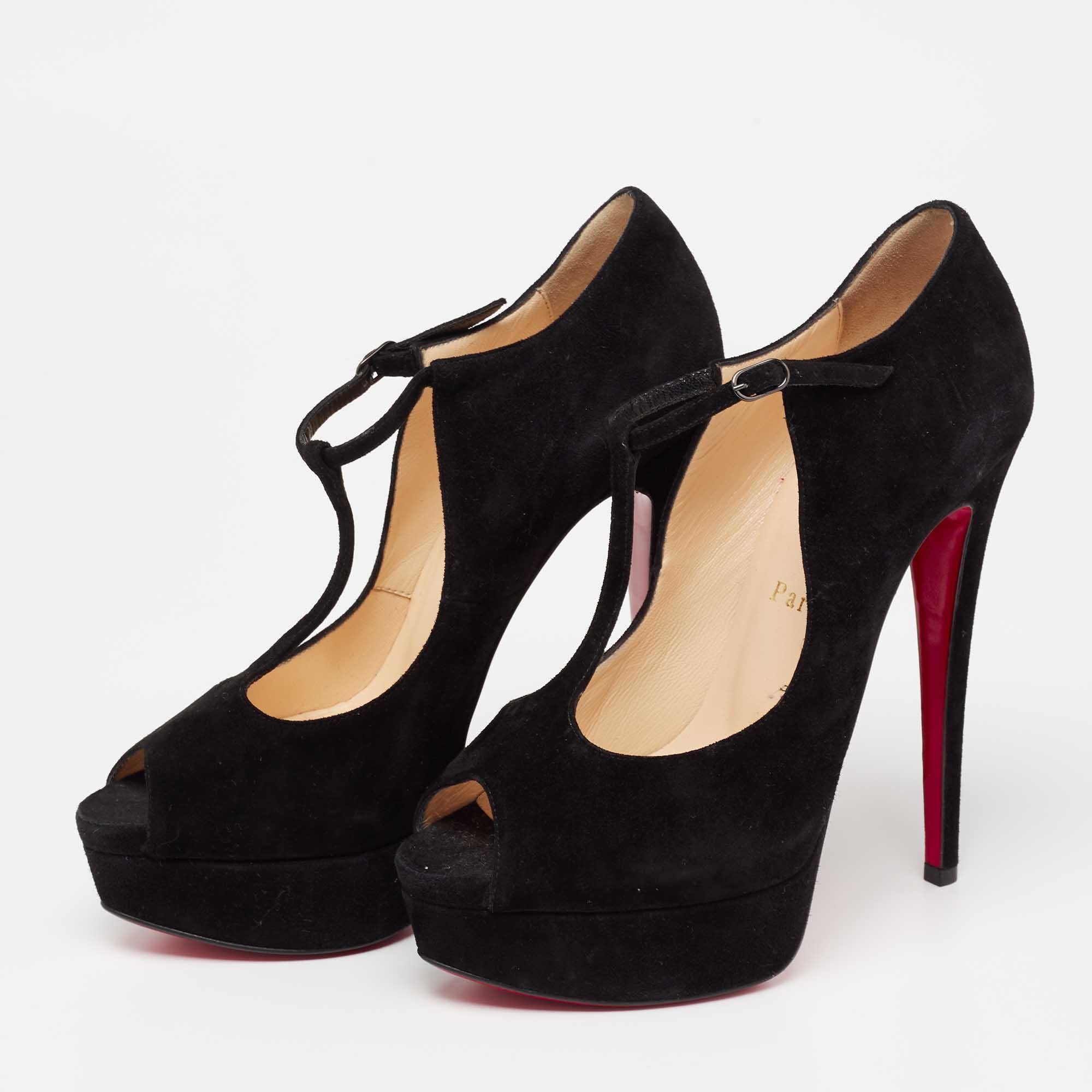 Christian Louboutin's feminine and classy pair of black T-strap pumps are made from smooth suede. The pair features a peep-toe style with peep-toes. The Alta Poppins pumps have comfortable leather-lined insoles. Pair this up with dresses for a dose