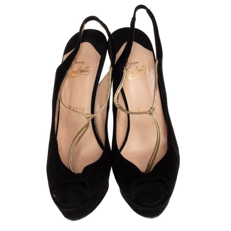 Be ready for constant attention and admirable glances from your audience when you walk in these platform sandals from Christian Louboutin. Crafted from black suede, they feature peep toes and slingbacks. They are elevated on 13.5 cm heels and