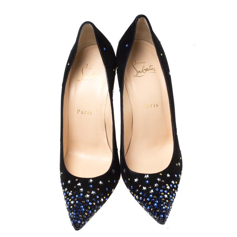Dazzle everyone with these Louboutins by owning them today. Crafted from suede, these black Gravitanita pumps carry a mesmerizing shape with pointed toes, 10.5 cm heels, and crystals and stars decorated all over. Complete with the signature red